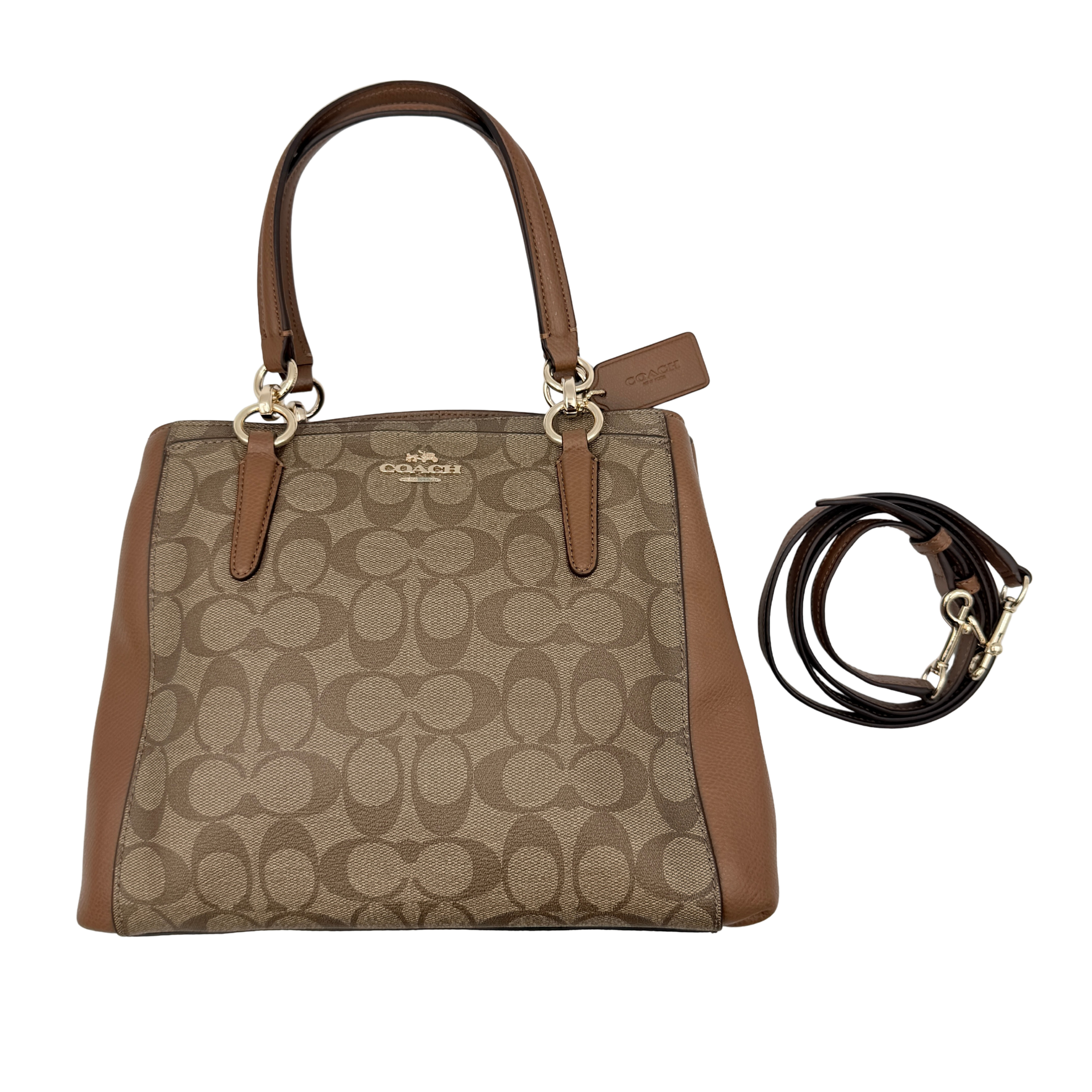 Coach Mini Christie Carryall in brown canvas and leather, shown with top handles and detachable strap.