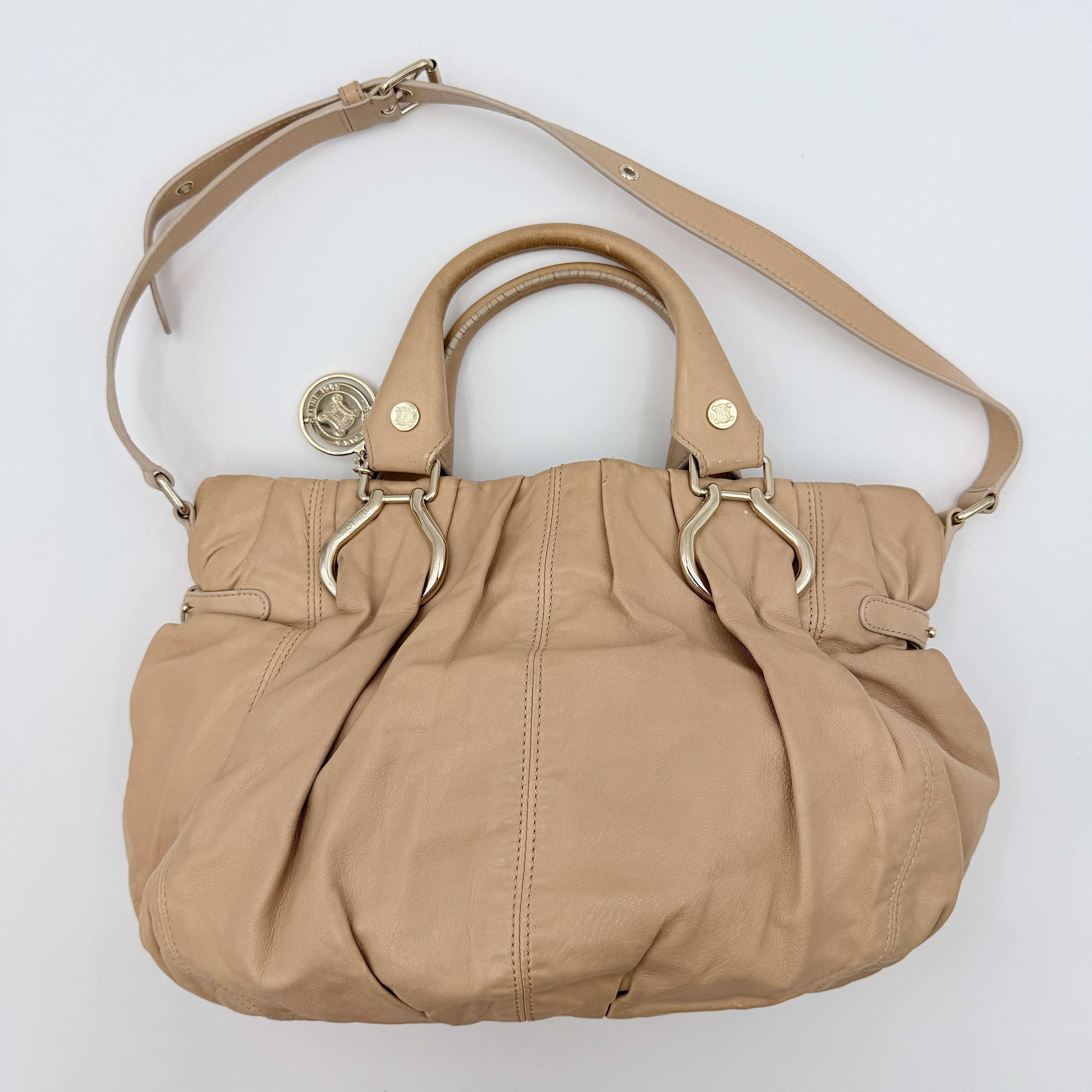 Celine 2Way Leather Shoulder Bag in muted brown leather with gold-tone hardware, adjustable strap, and double handles.