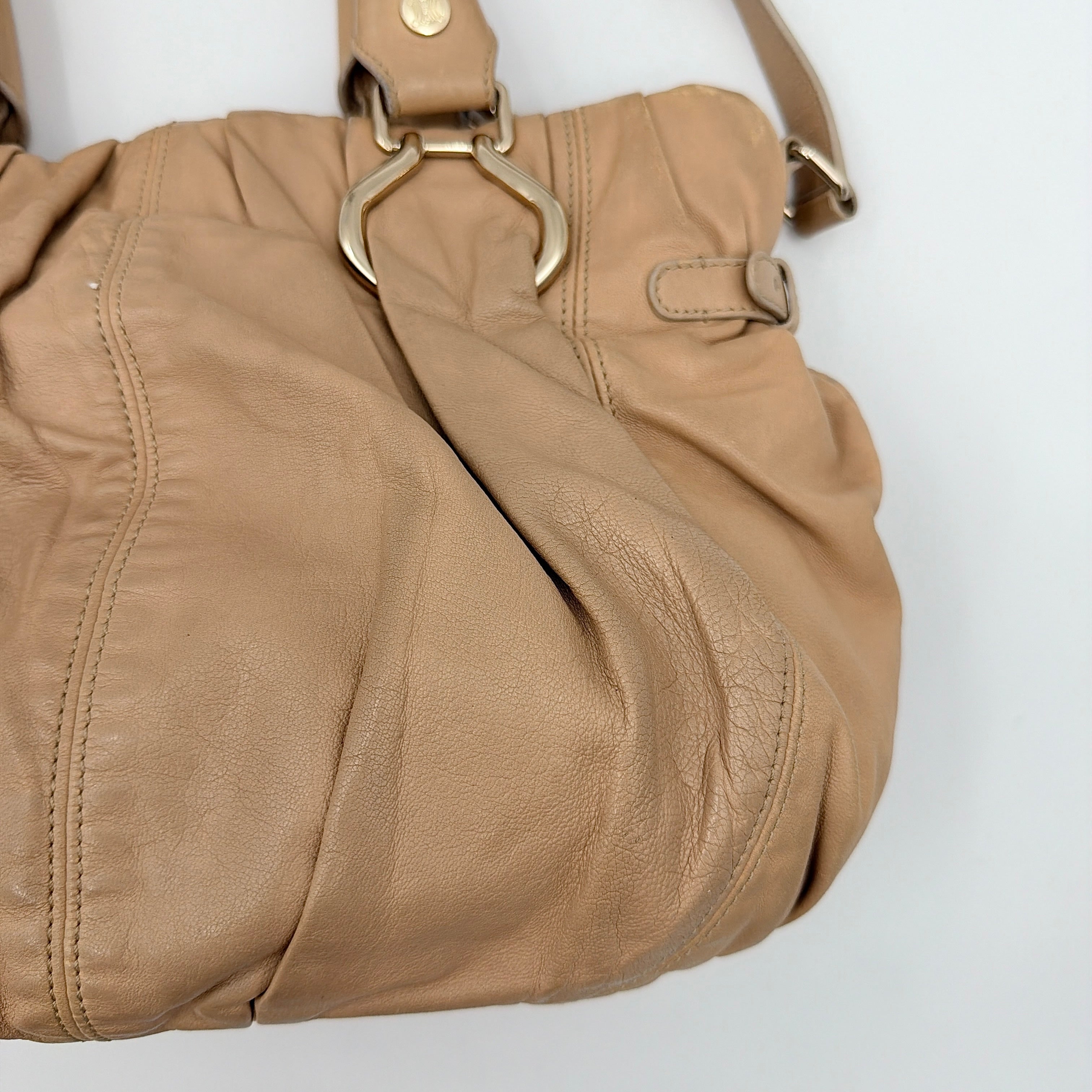 Celine 2Way Leather Shoulder Bag in muted brown leather with gold-tone hardware, adjustable strap, and double handles.