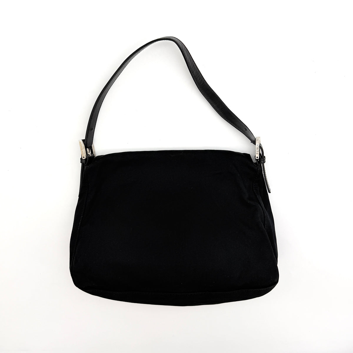Fendi Mamma Baguette Shoulder Bag in black fabric with silver FF buckle and leather strap, photographed on a white backdrop.