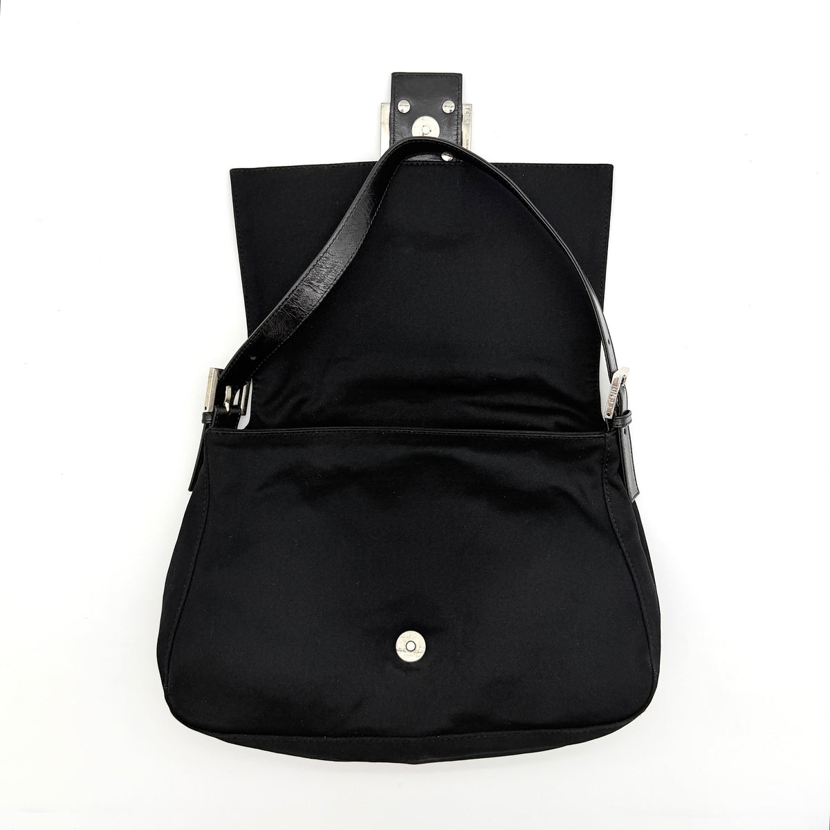 Fendi Mamma Baguette Shoulder Bag in black fabric with silver FF buckle and leather strap, photographed on a white backdrop.