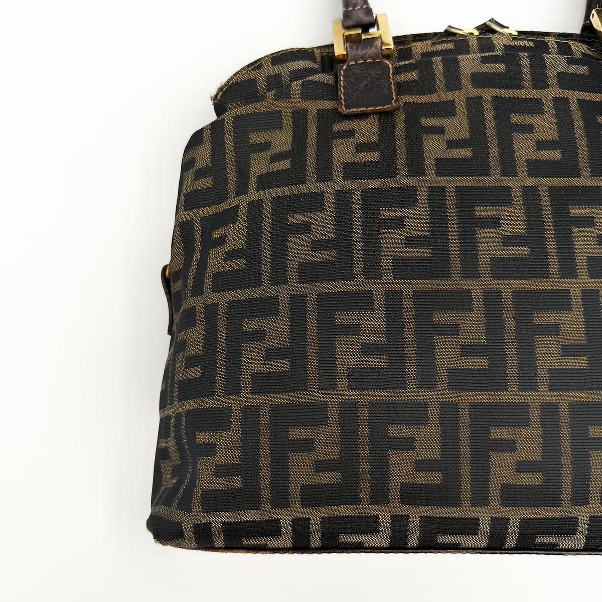 Fendi Zucca FF Monogram Handbag in brown canvas with leather handles and gold hardware, displayed against a clean background.