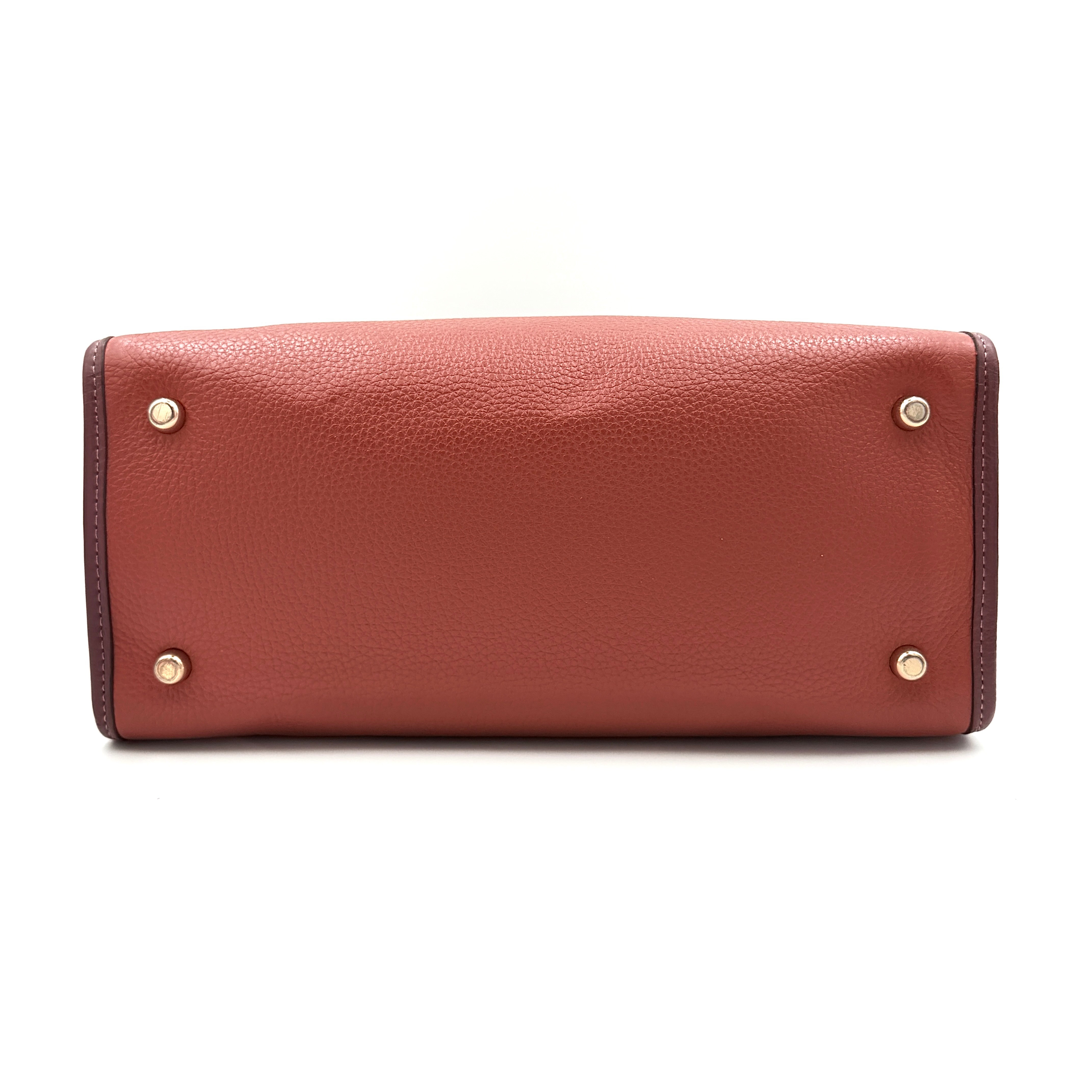 Coach 2Way Signature 22 Dempsey Tote in brown jacquard and burgundy leather with orange logo patch, shown with detachable strap.