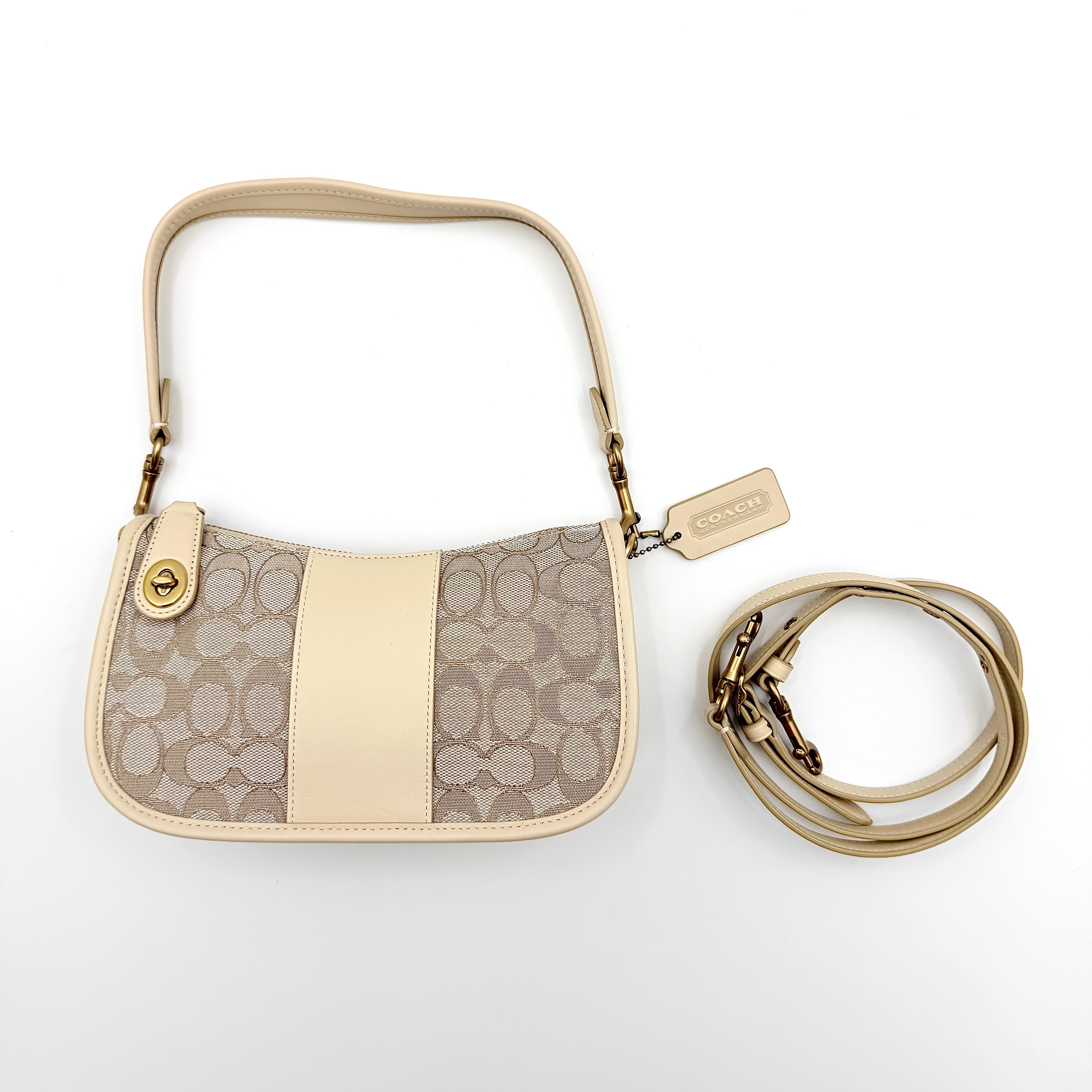 Coach Swinger 20 Stripe shoulder bag in grey and beige canvas with cream leather trim, shown with detachable strap and gold hardware.