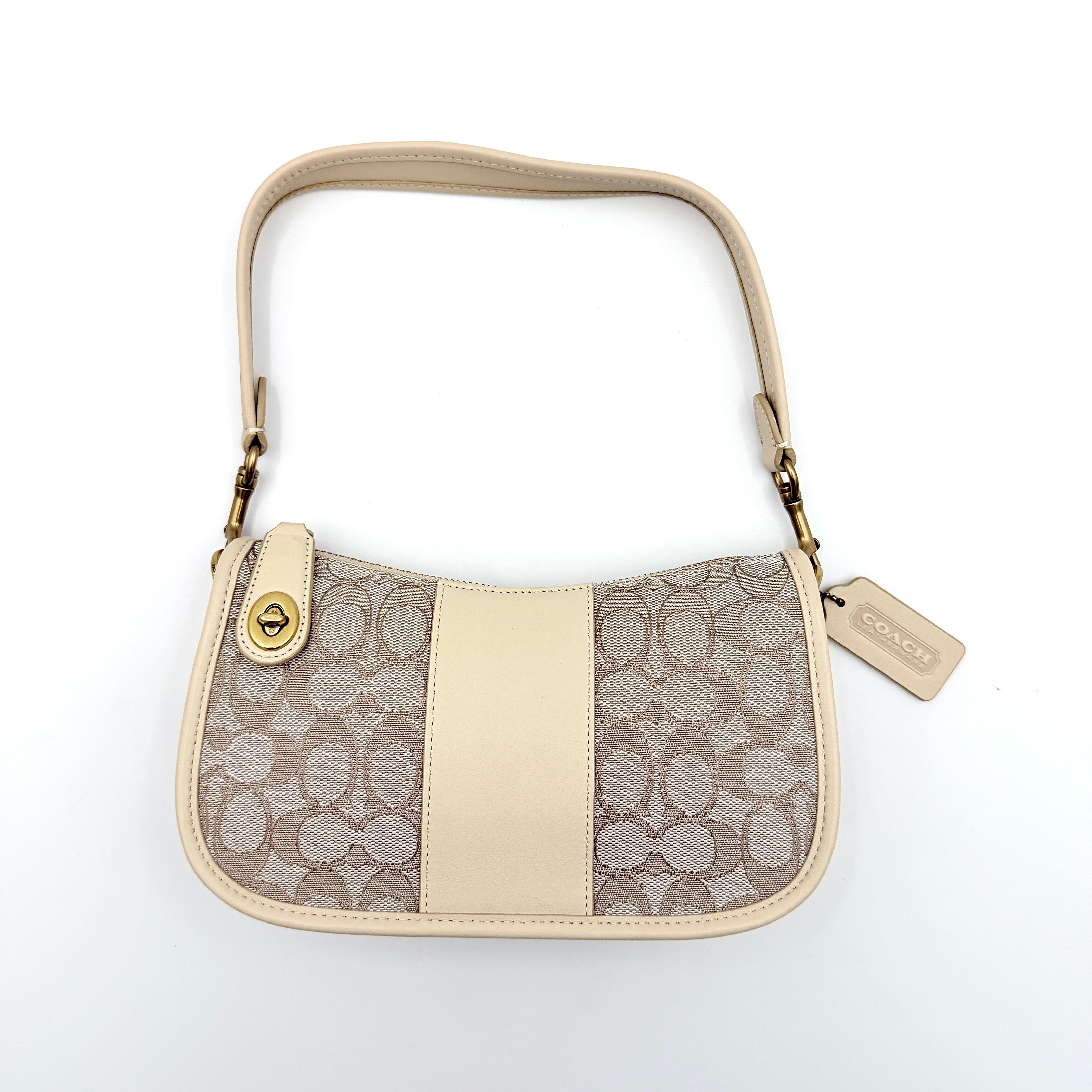 Coach Swinger 20 Stripe shoulder bag in grey and beige canvas with cream leather trim, shown with detachable strap and gold hardware.