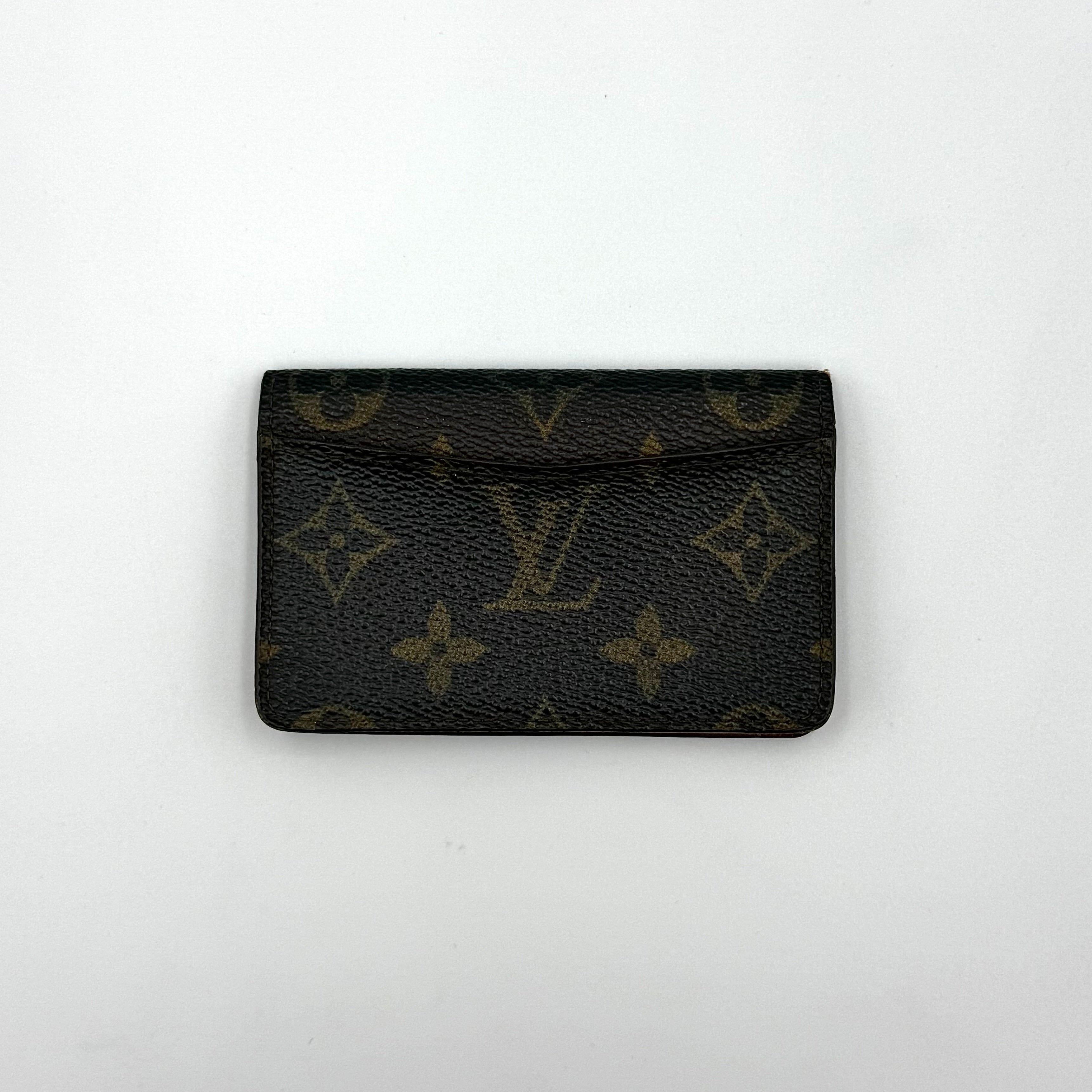 Louis Vuitton Monogram Pocket Organizer in brown canvas with the iconic LV monogram and a structured profile.