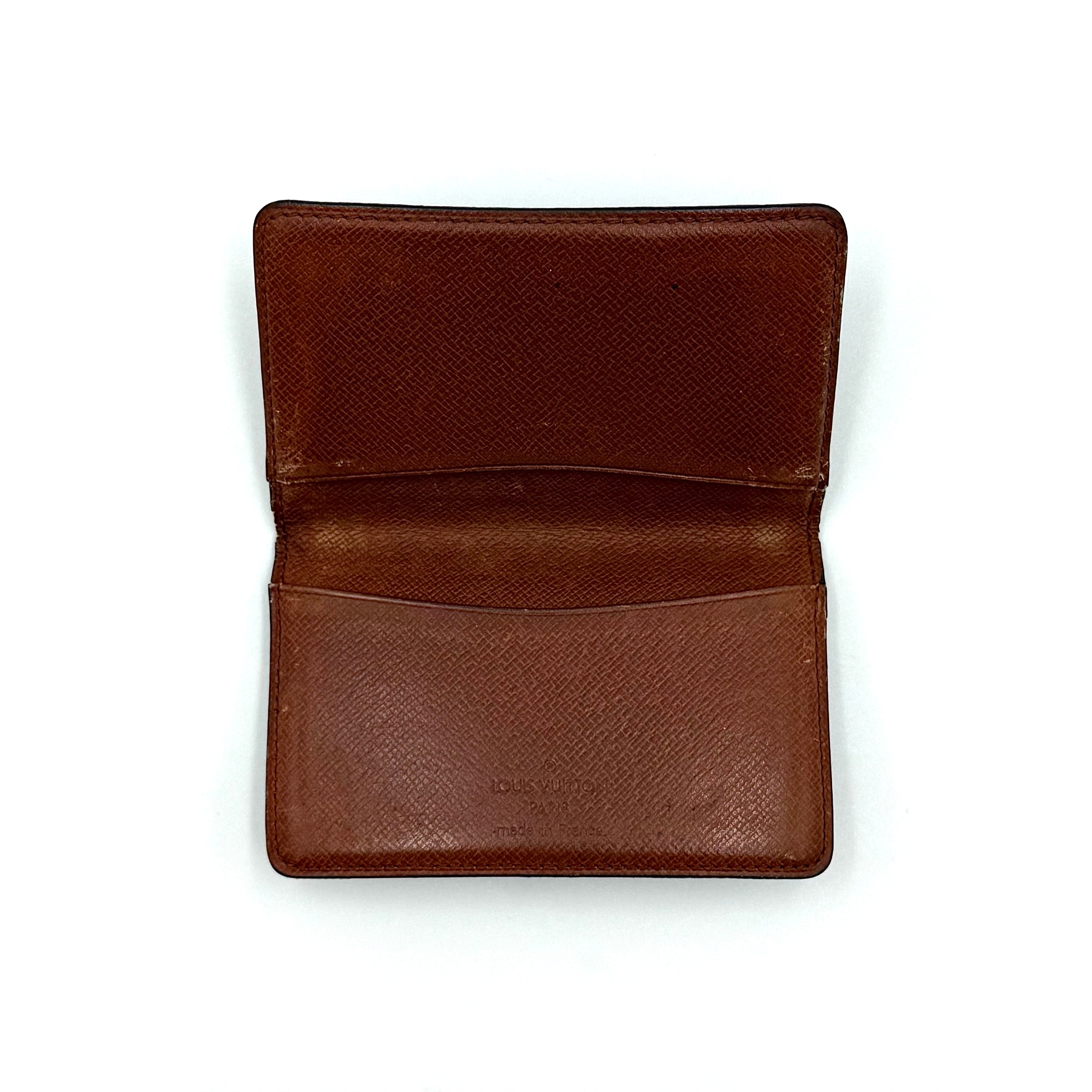 Louis Vuitton Monogram Pocket Organizer in brown canvas with the iconic LV monogram and a structured profile.