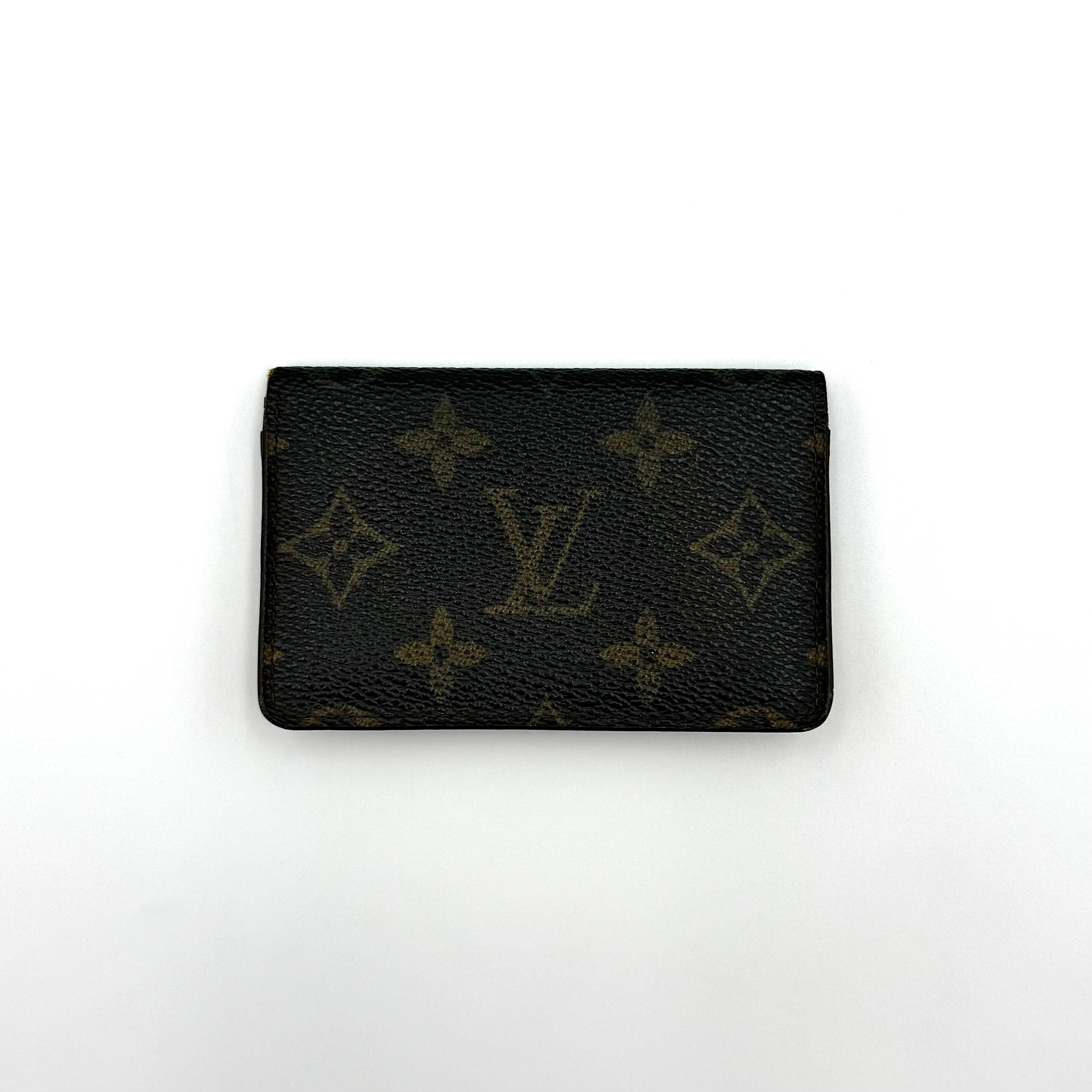 Louis Vuitton Monogram Pocket Organizer in brown canvas with the iconic LV monogram and a structured profile.