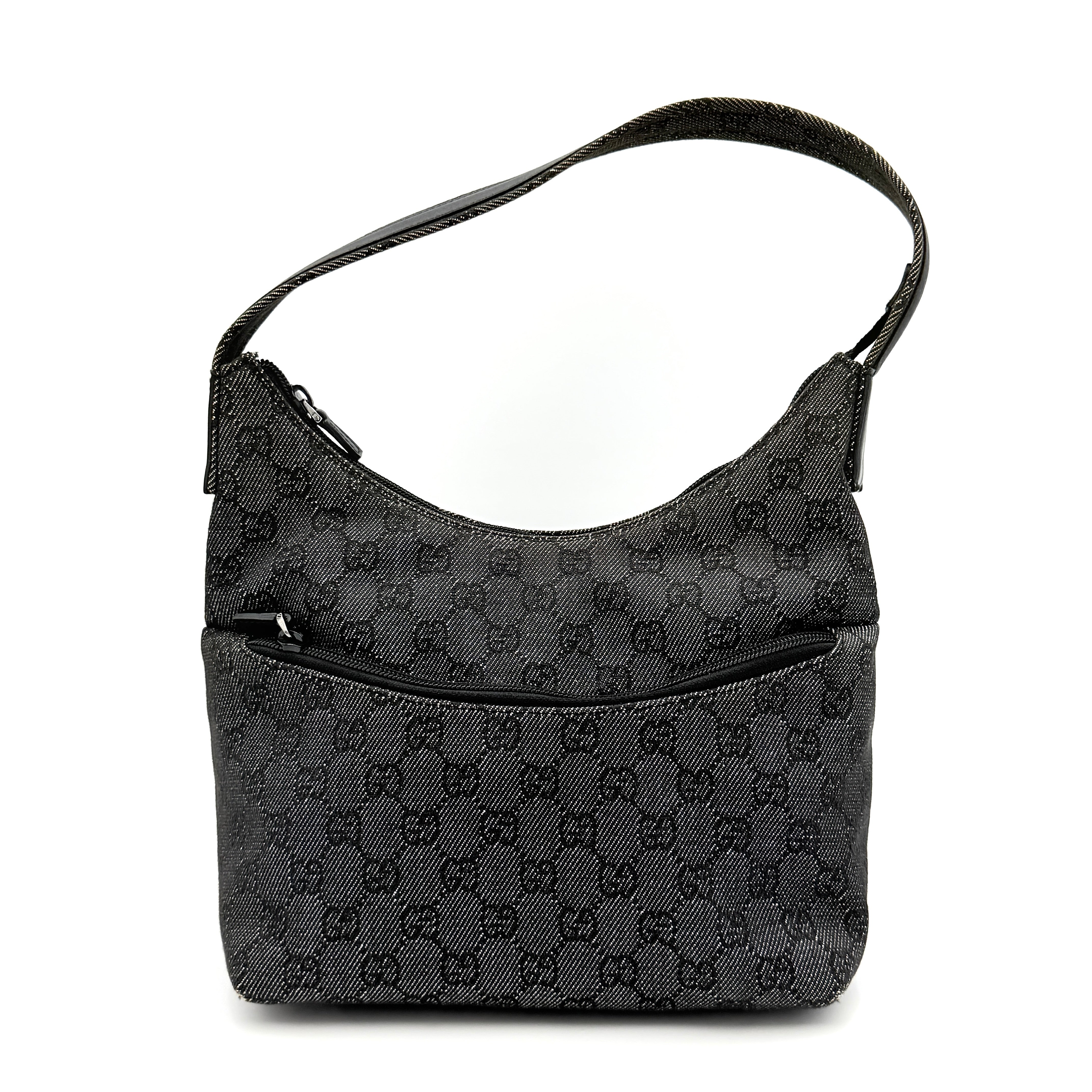 Gucci GG Monogram Hobo Shoulder Bag in black canvas with tonal GG pattern and a curved shoulder strap, photographed on a white background.