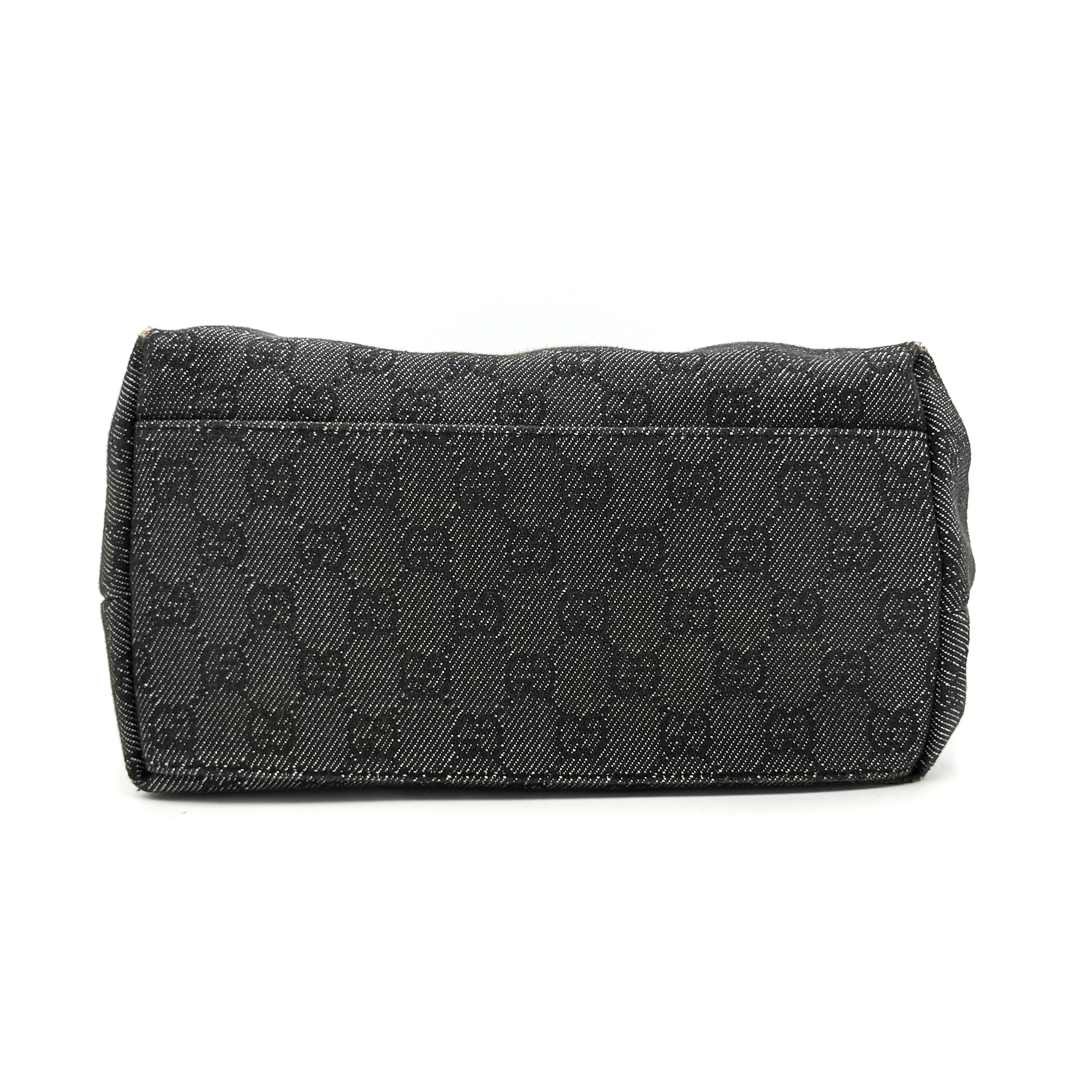 Gucci GG Monogram Hobo Shoulder Bag in black canvas with tonal GG pattern and a curved shoulder strap, photographed on a white background.