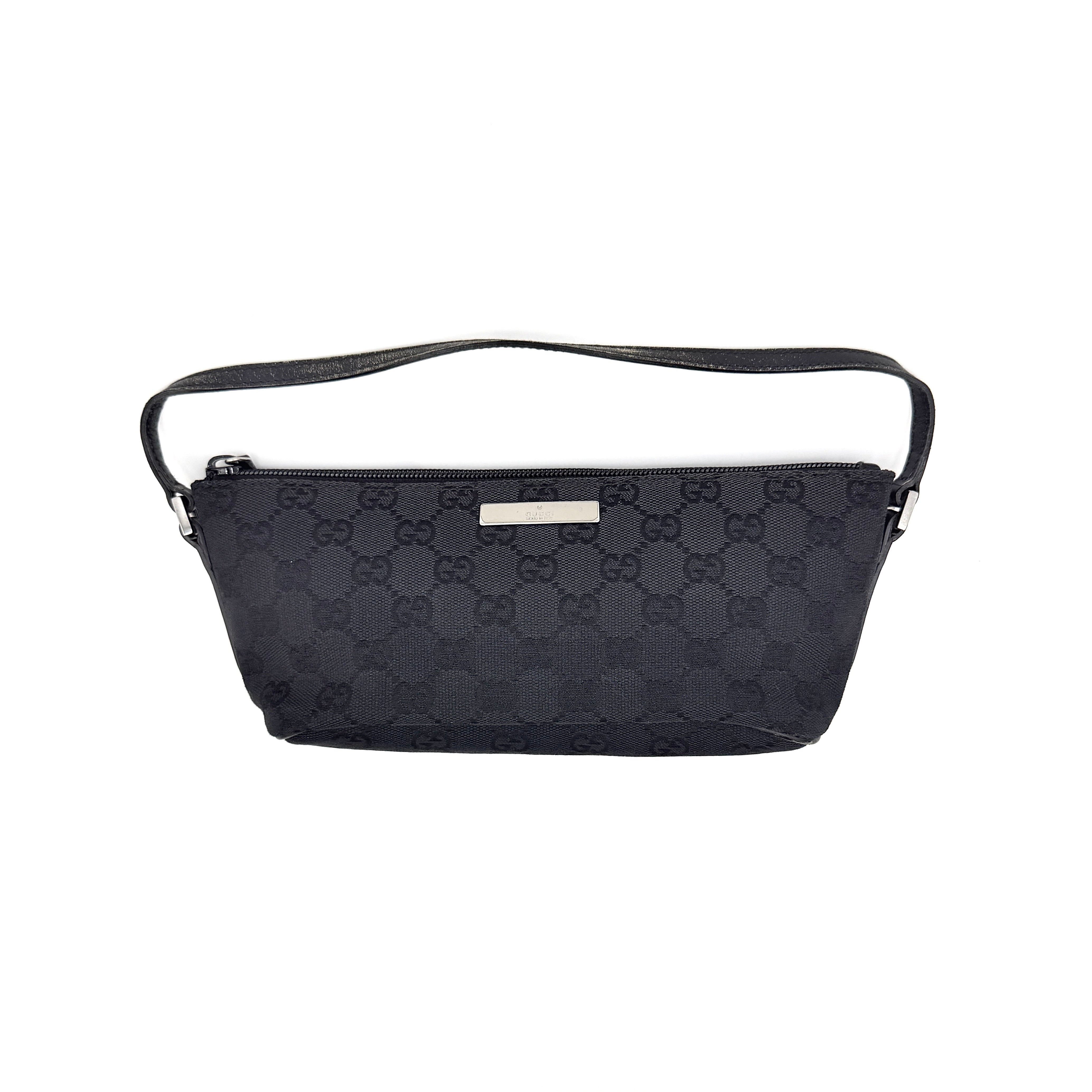 The Gucci GG Monogram Pochette Boat Shoulder Bag in black canvas with leather trim and silver-tone hardware, shown from the front with its structured, compact shape.