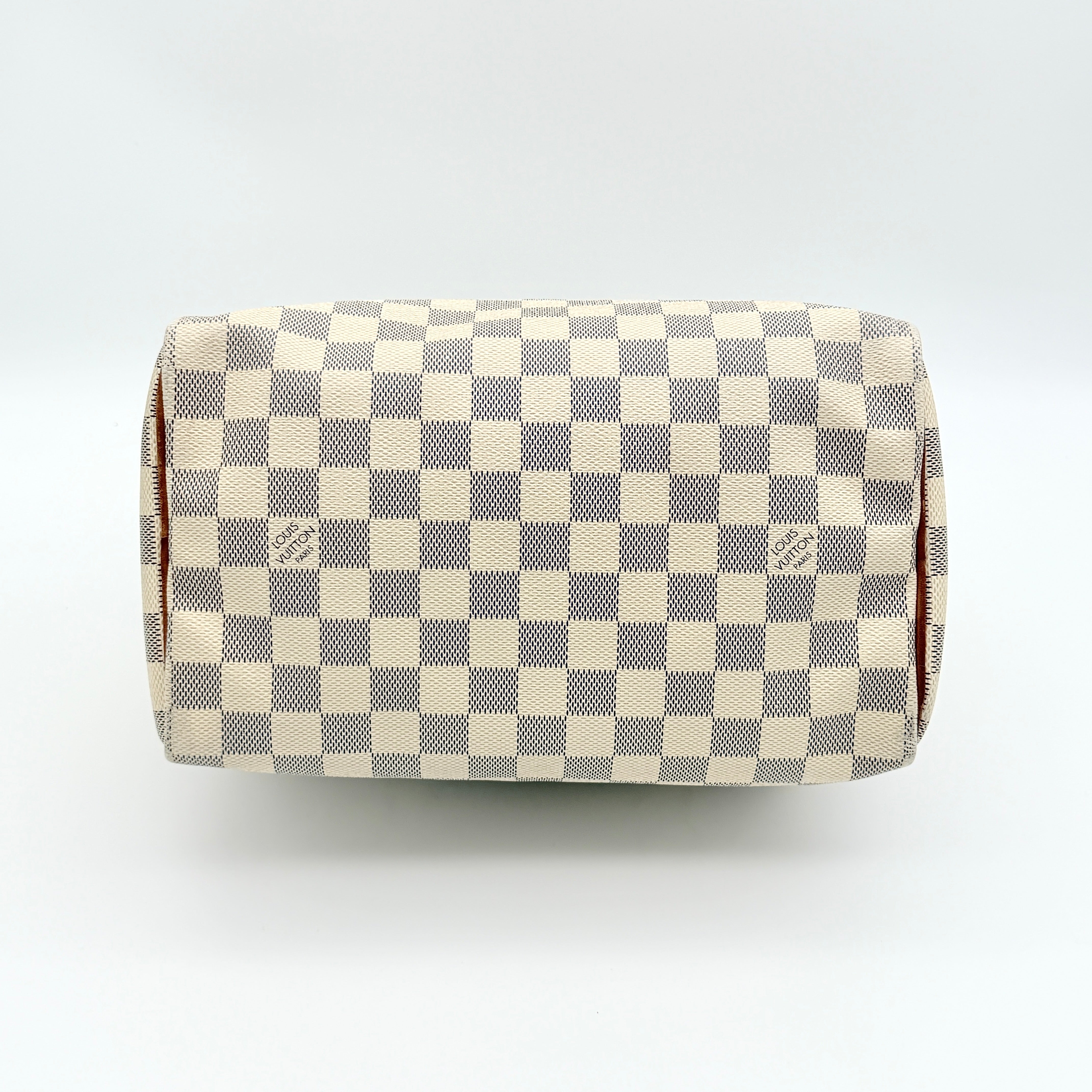 Louis Vuitton Damier Azur Speedy 25 handbag with natural leather handles, brass hardware, and included LV padlock and keys.