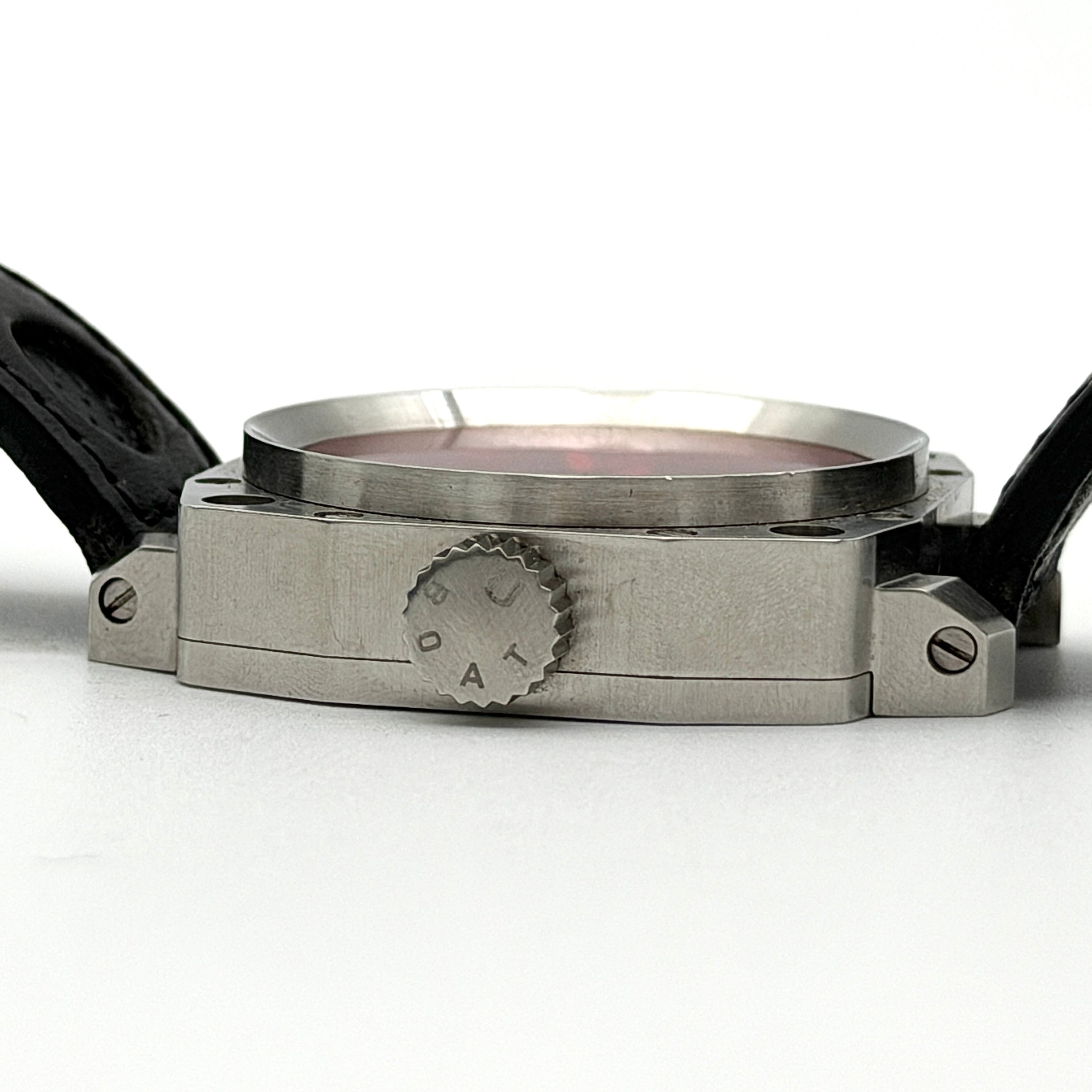 U-Boat Thousands Of Feet stainless steel watch with red dial and black leather strap, displayed on black branded box