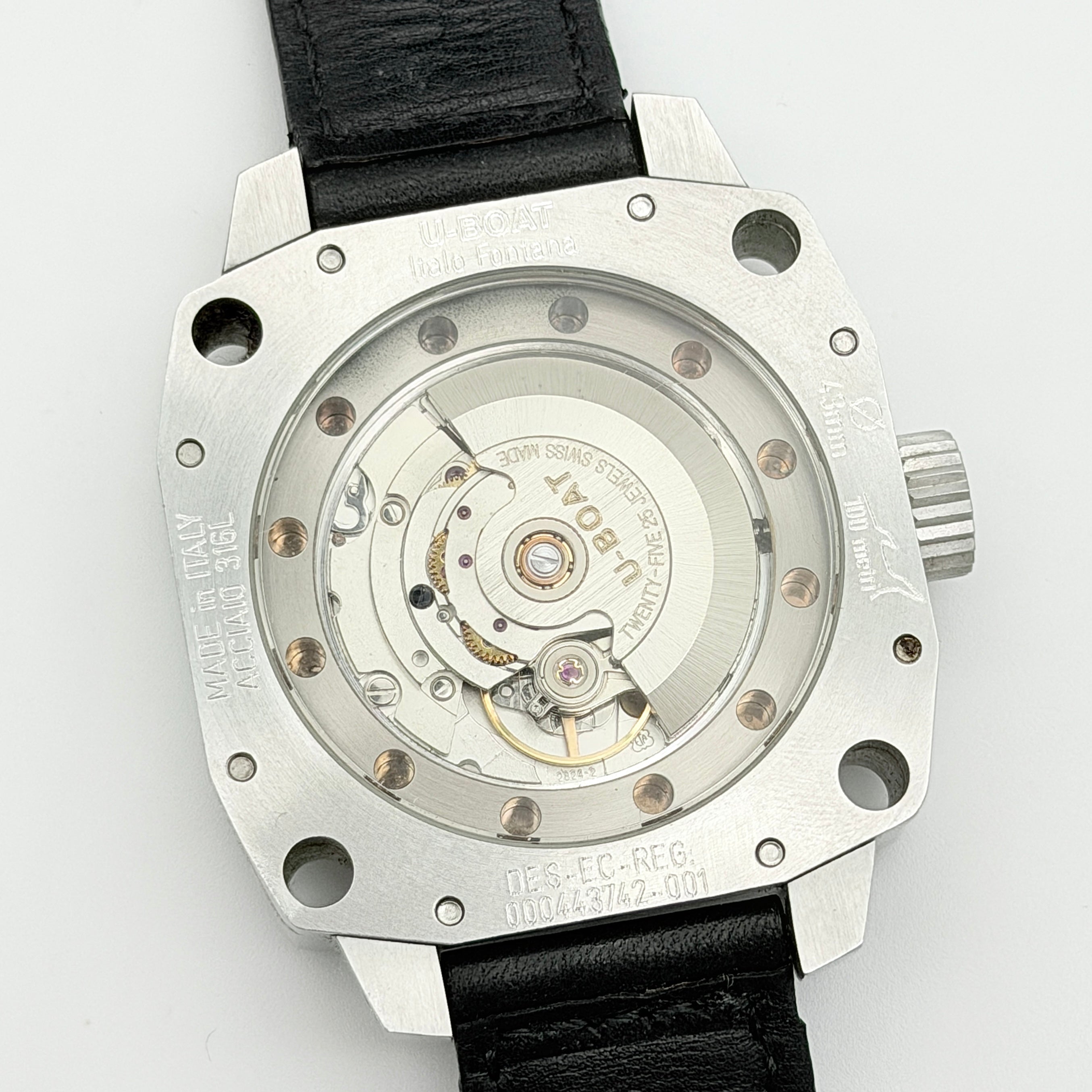 U-Boat Thousands Of Feet stainless steel watch with red dial and black leather strap, displayed on black branded box