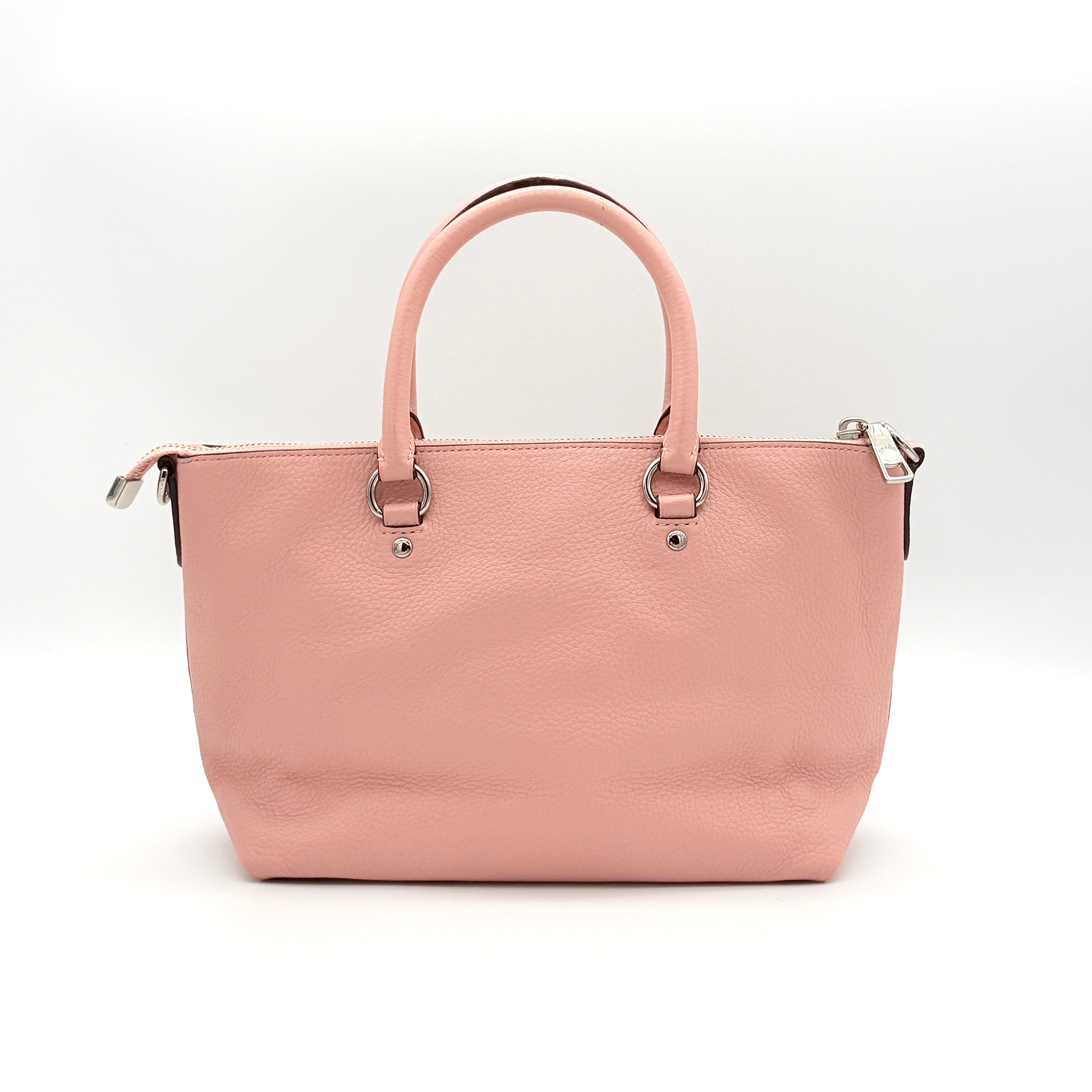 Coach Mini Emma Satchel in pink pebbled leather with silver-tone hardware, shown with detachable strap.