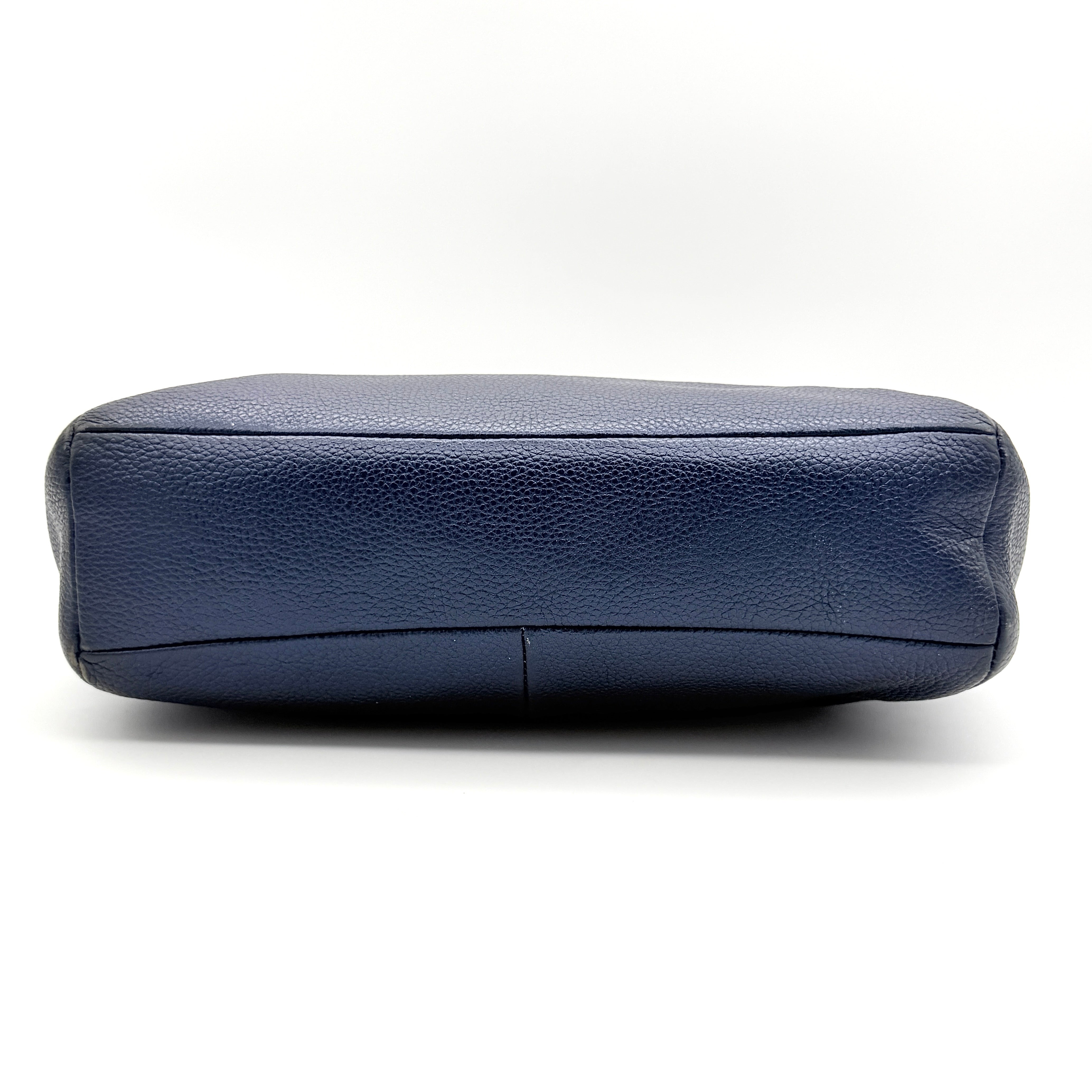 Coach Kelsey 2Way shoulder bag in navy blue pebble leather with silver-tone hardware, shown with detachable strap.