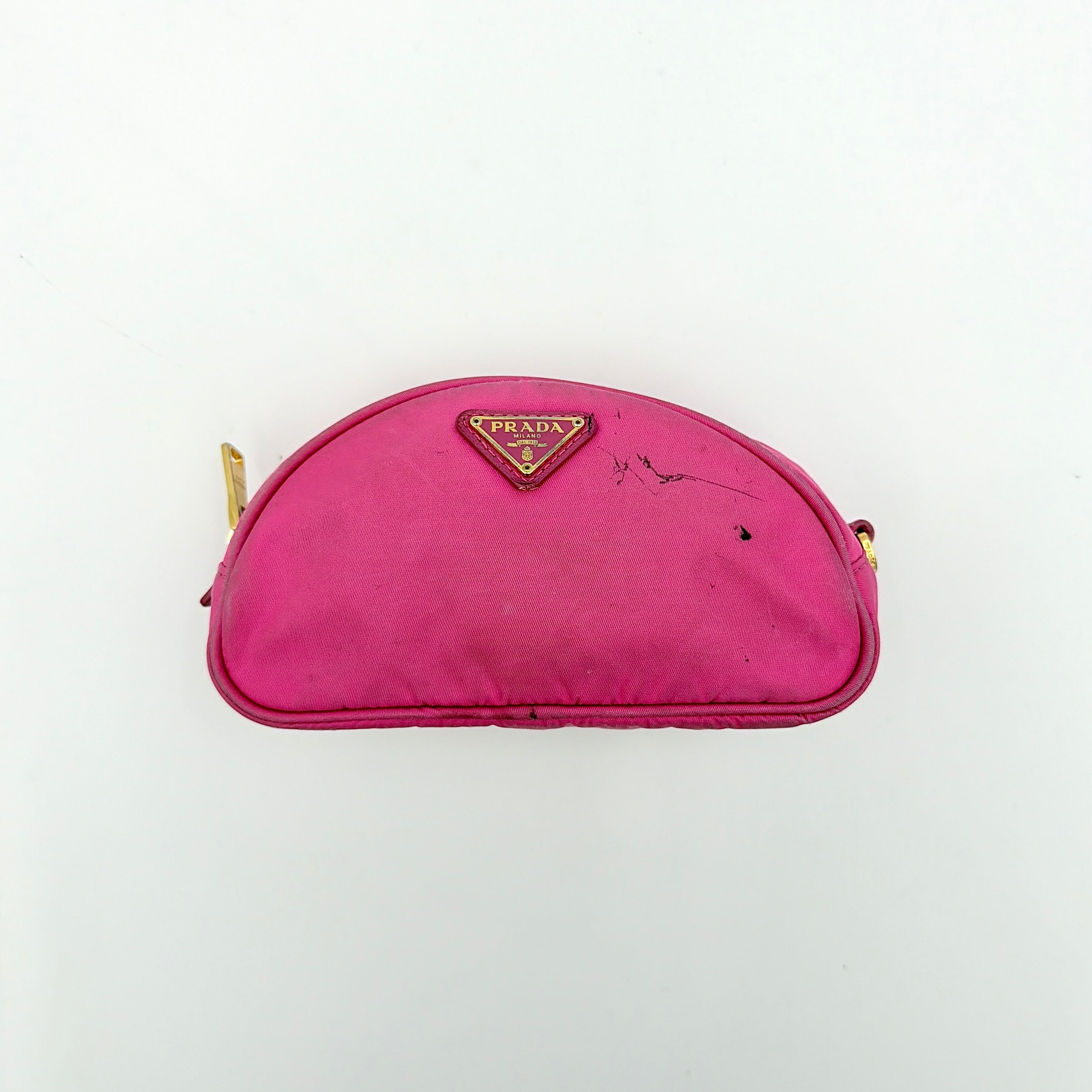 Prada Tessuto Nylon Pouch in vibrant pink with gold-tone hardware and triangle logo, showing visible wear on the exterior.