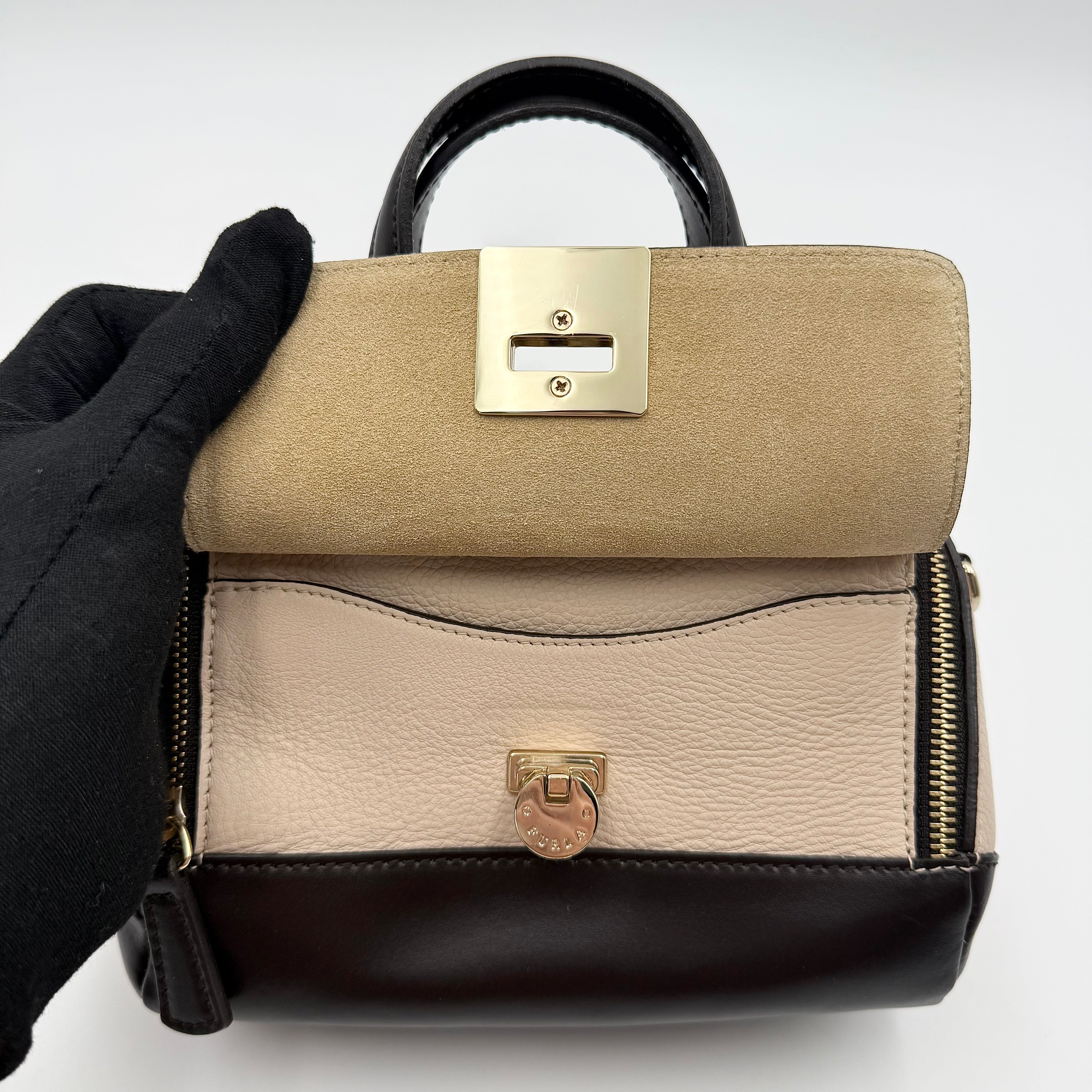 Furla 2Way Leopard Shoulder Bag in black leather with top handles, leopard print front, and detachable strap displayed beside it.