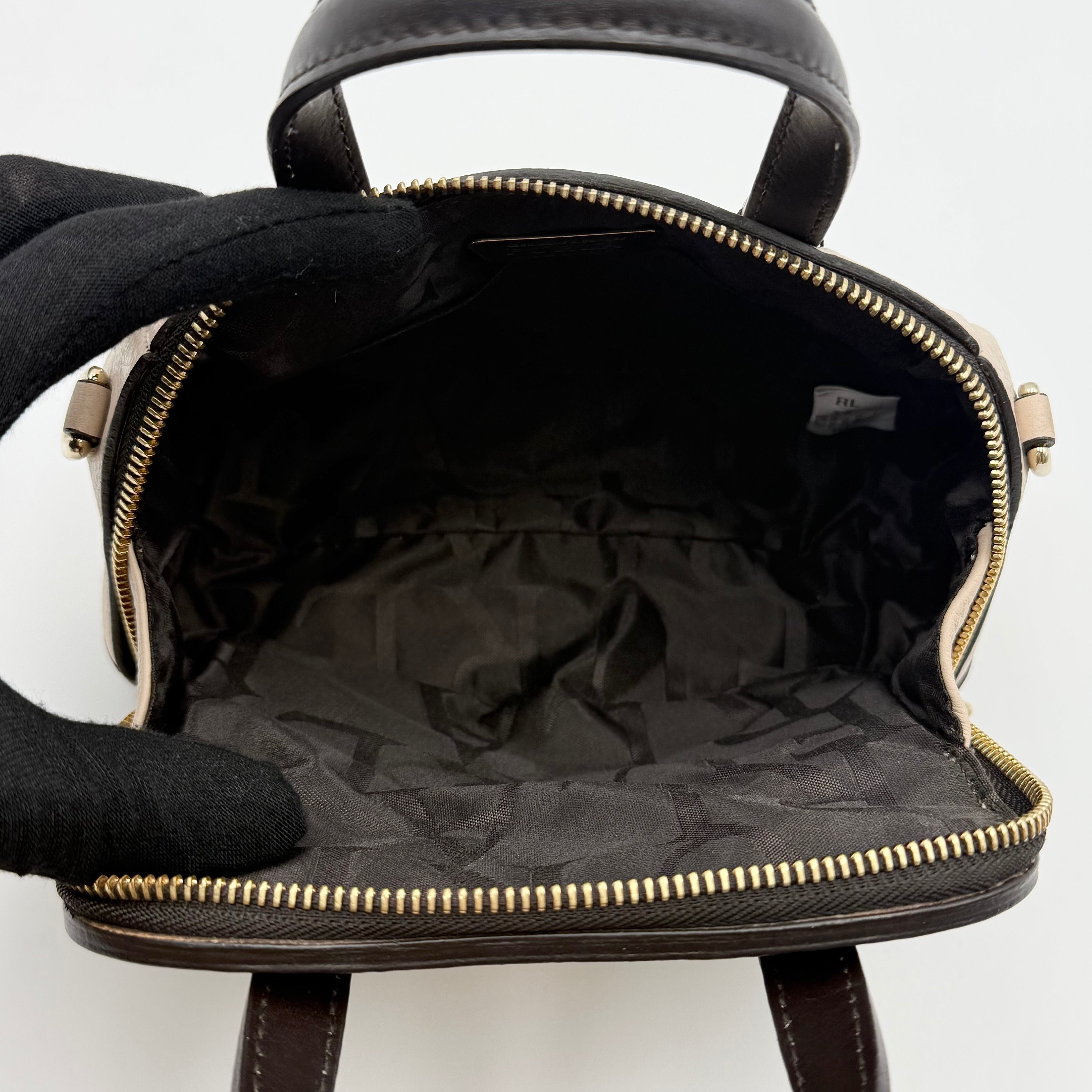 Furla 2Way Leopard Shoulder Bag in black leather with top handles, leopard print front, and detachable strap displayed beside it.