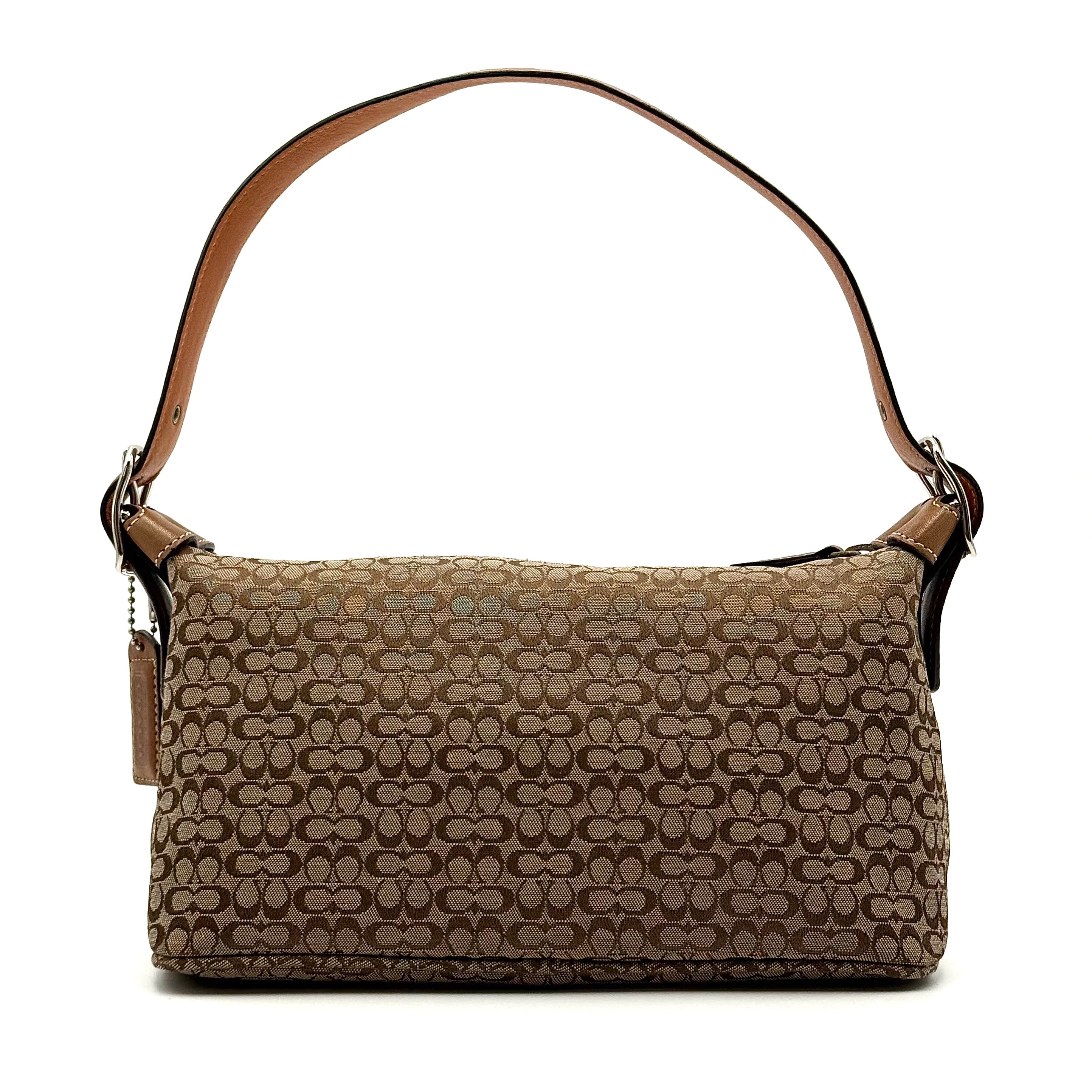 Coach signature beige jacquard hobo shoulder bag with tan leather trim and silver-tone hardware.