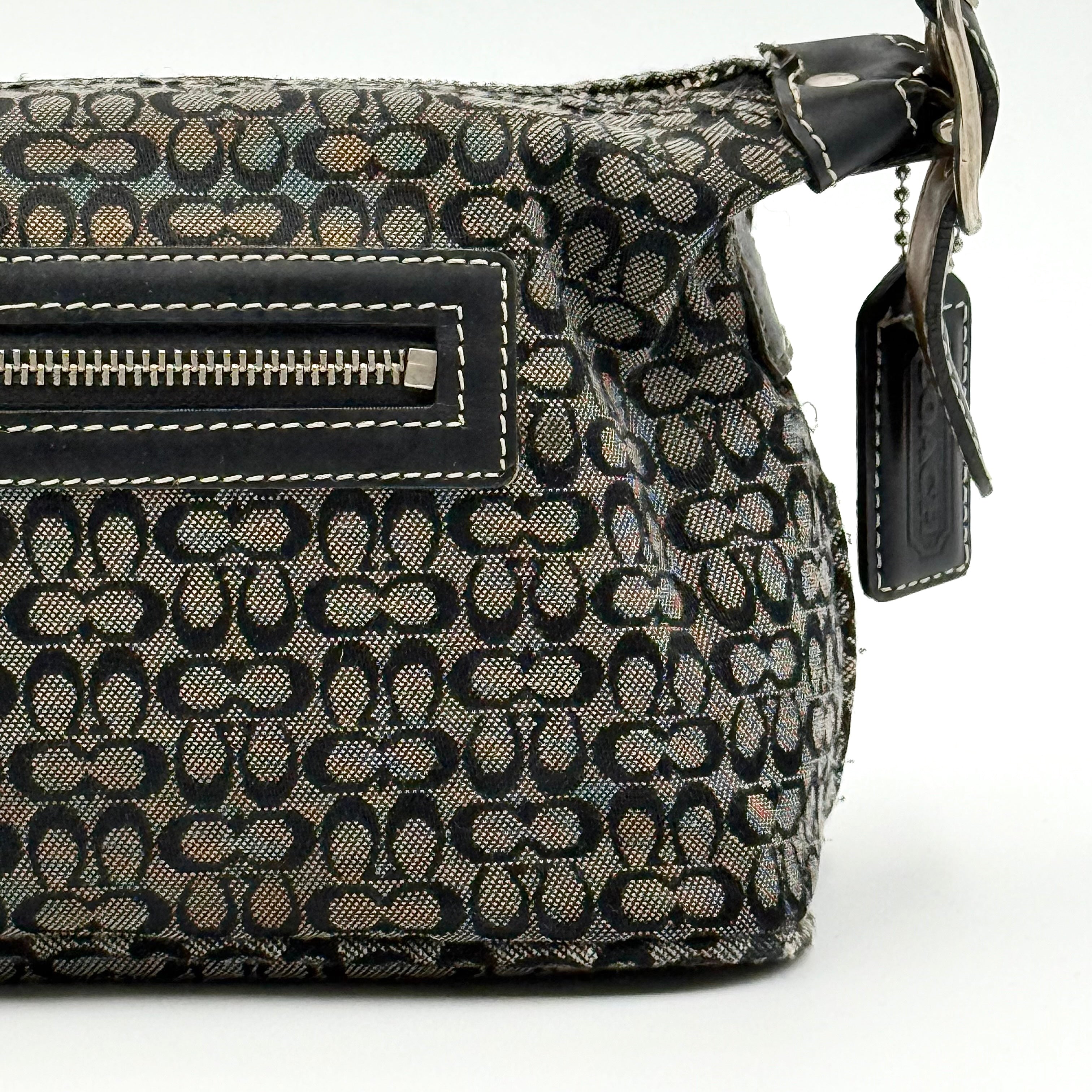Coach Signature Hobo Shoulder Bag in grey and black canvas with leather trim and silver hardware, shown with monogram detail.