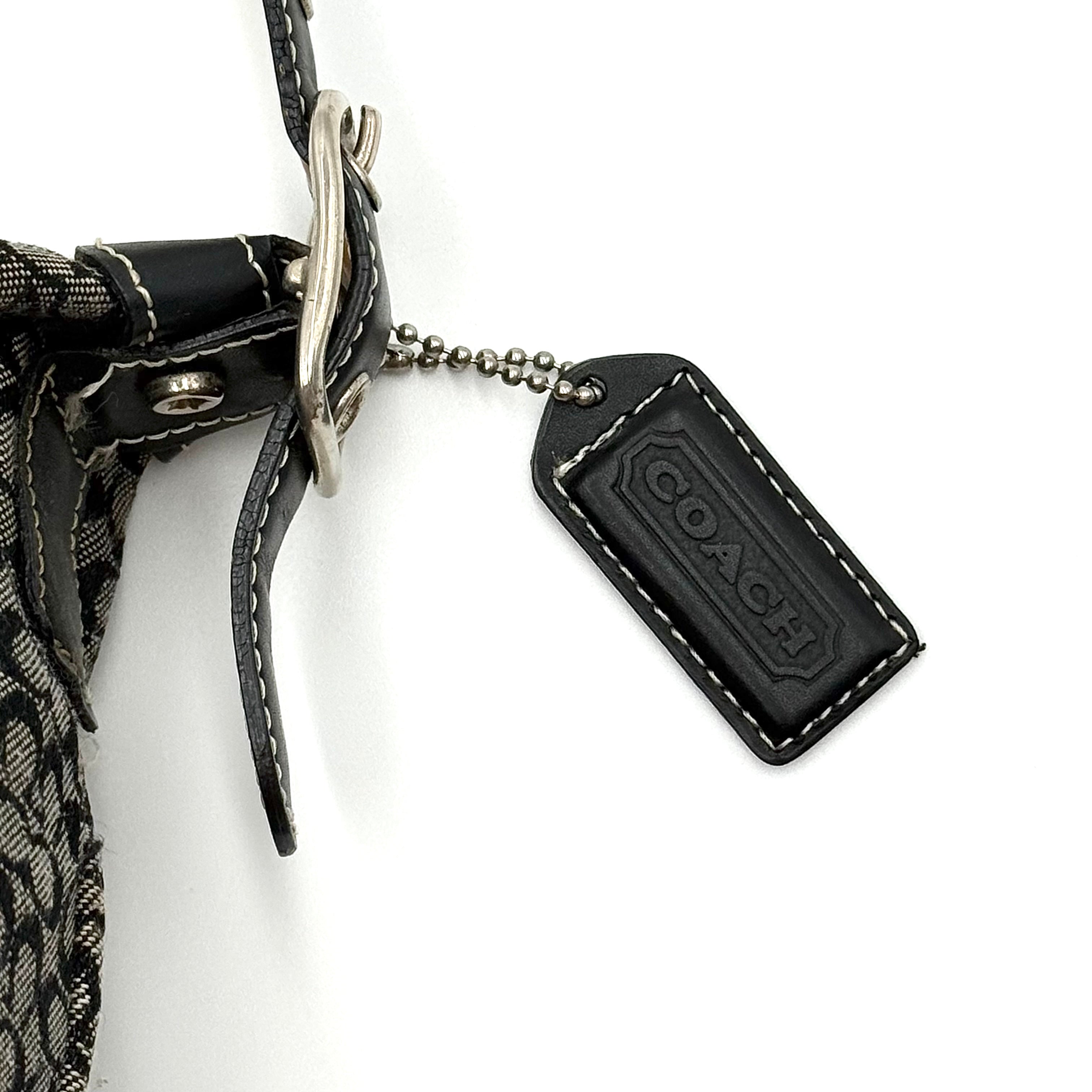 Coach Signature Hobo Shoulder Bag in grey and black canvas with leather trim and silver hardware, shown with monogram detail.
