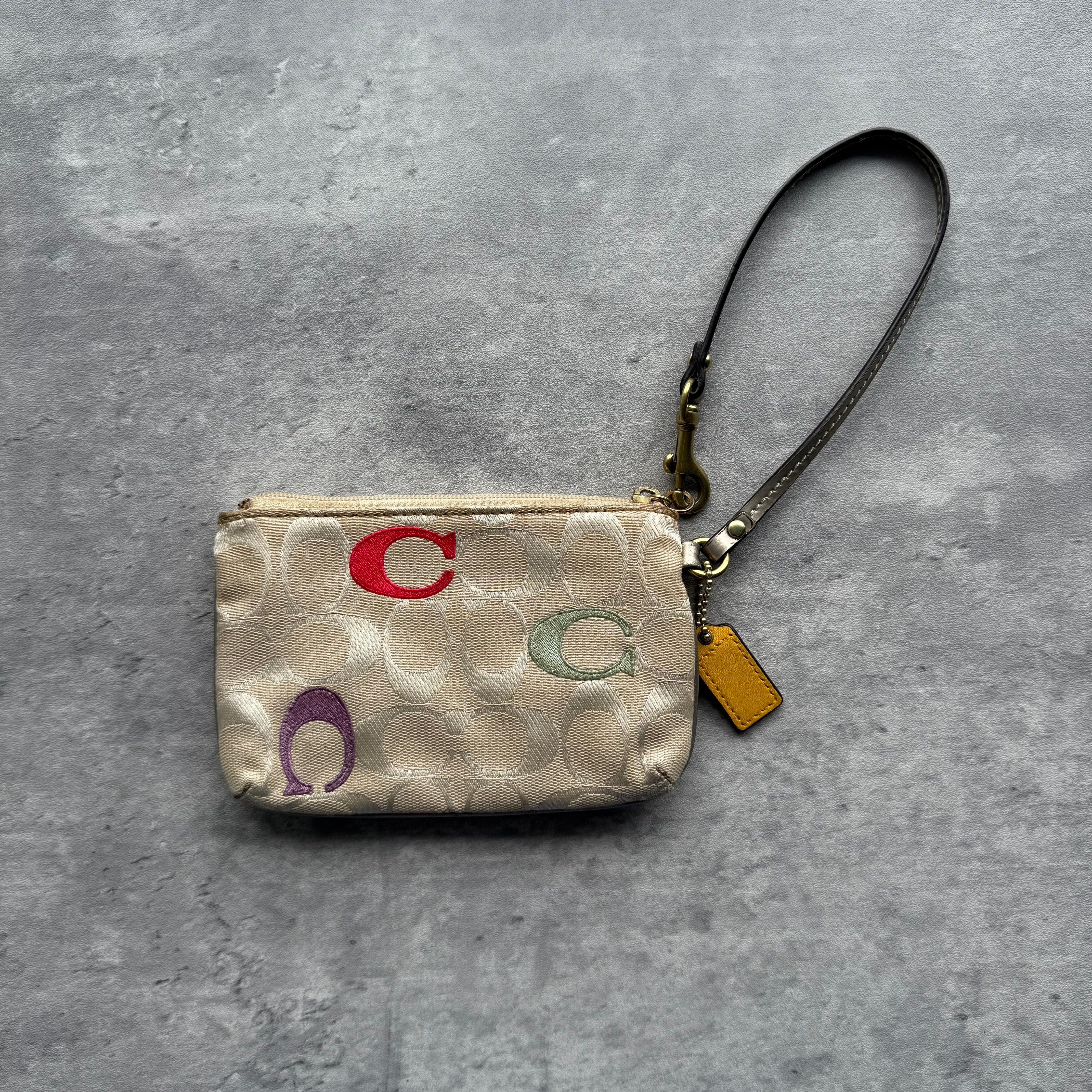 Coach Poppy Zip Wrislet Cream