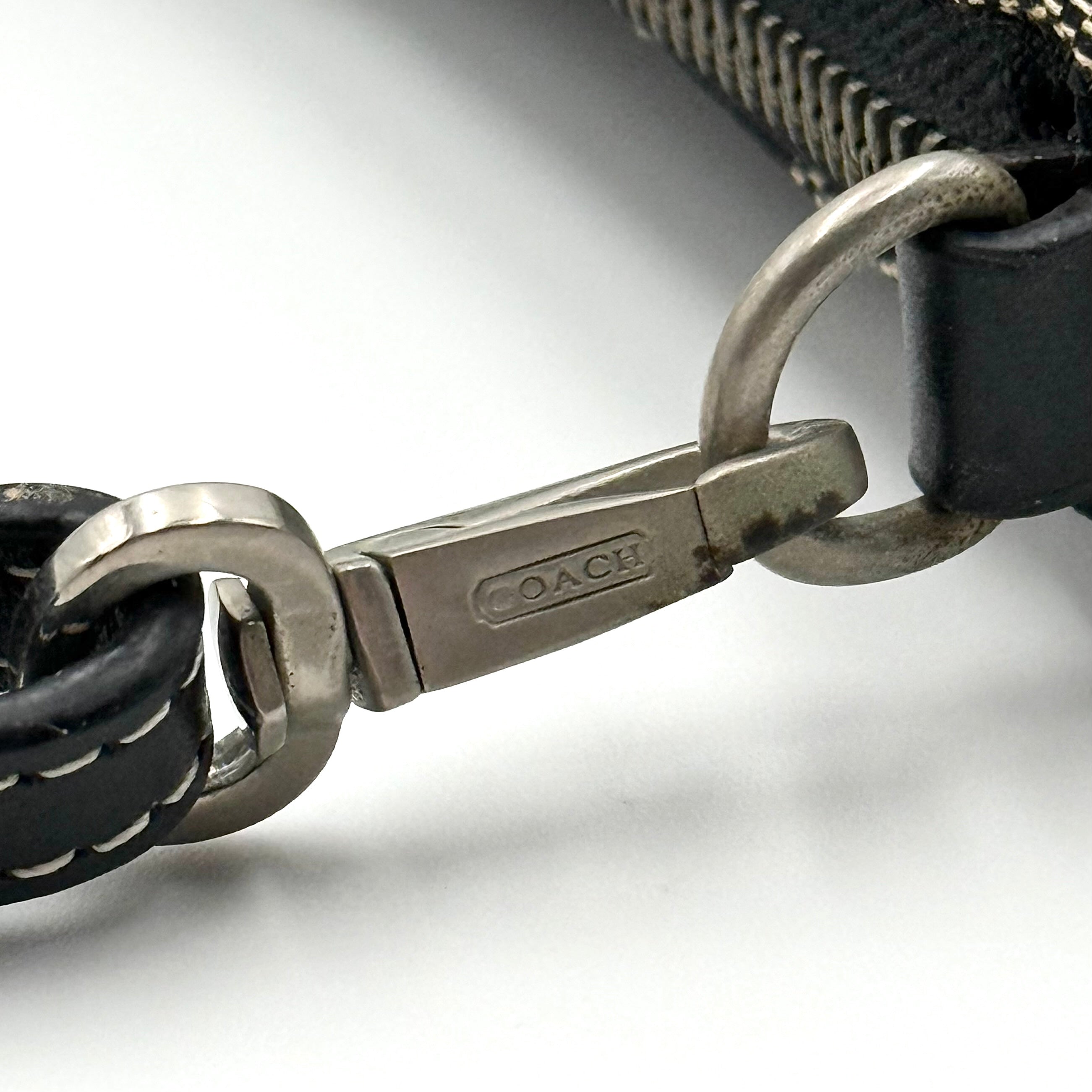 Coach Y2K Demi Shoulder Bag in black and grey signature jacquard with black leather trim and silver hardware.