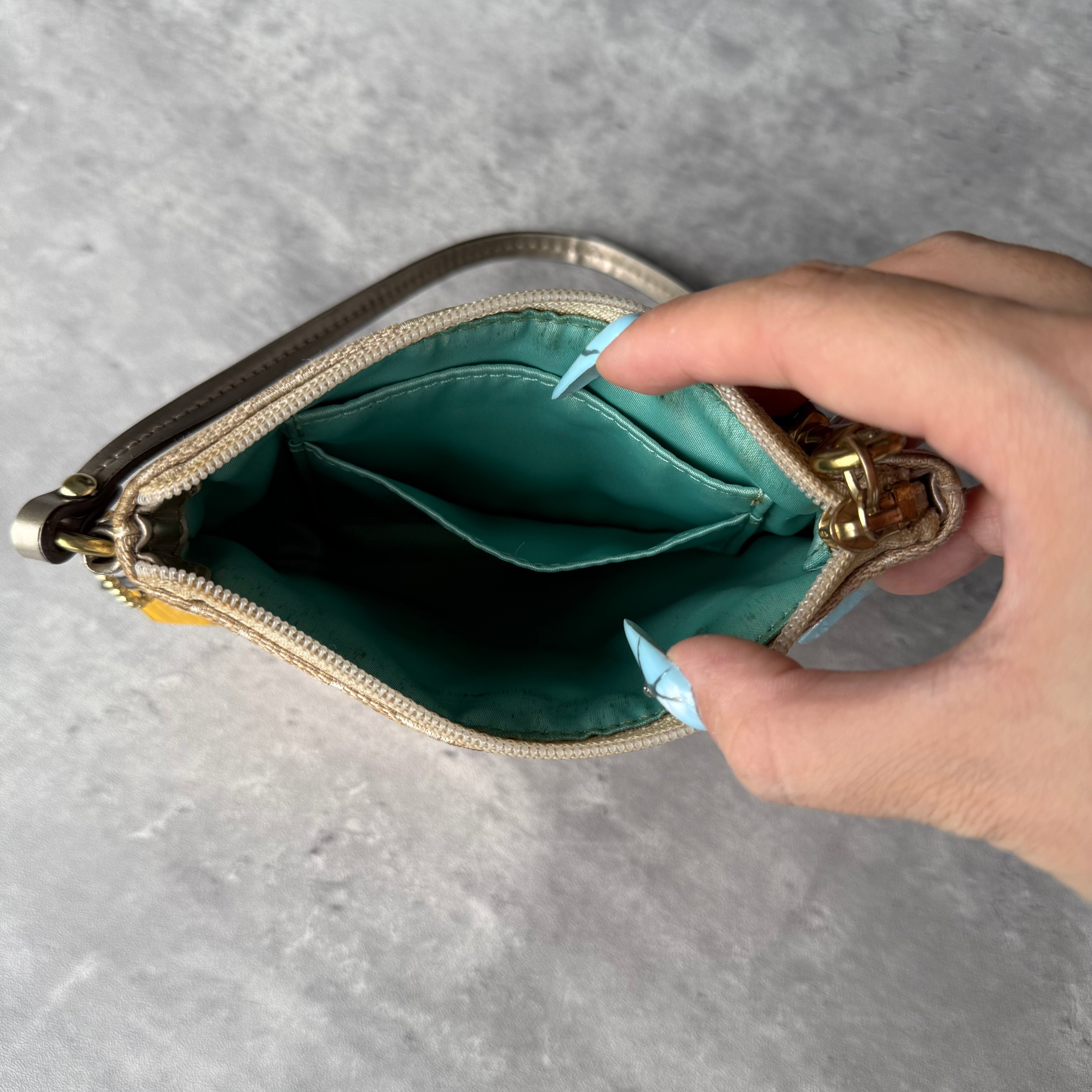 Coach Poppy Zip Wrislet Cream