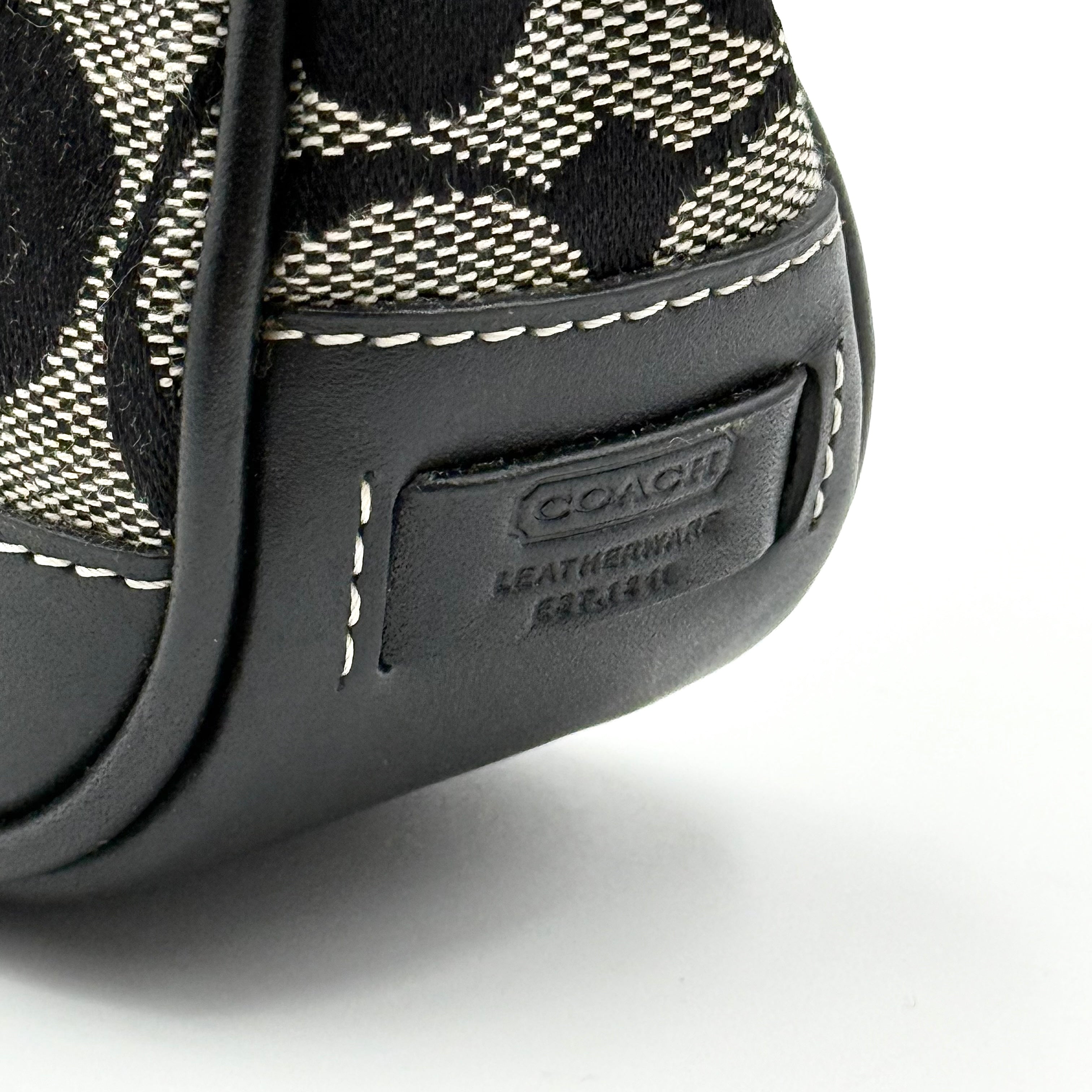 Coach Y2K Demi Shoulder Bag in black and grey signature jacquard with black leather trim and silver hardware.
