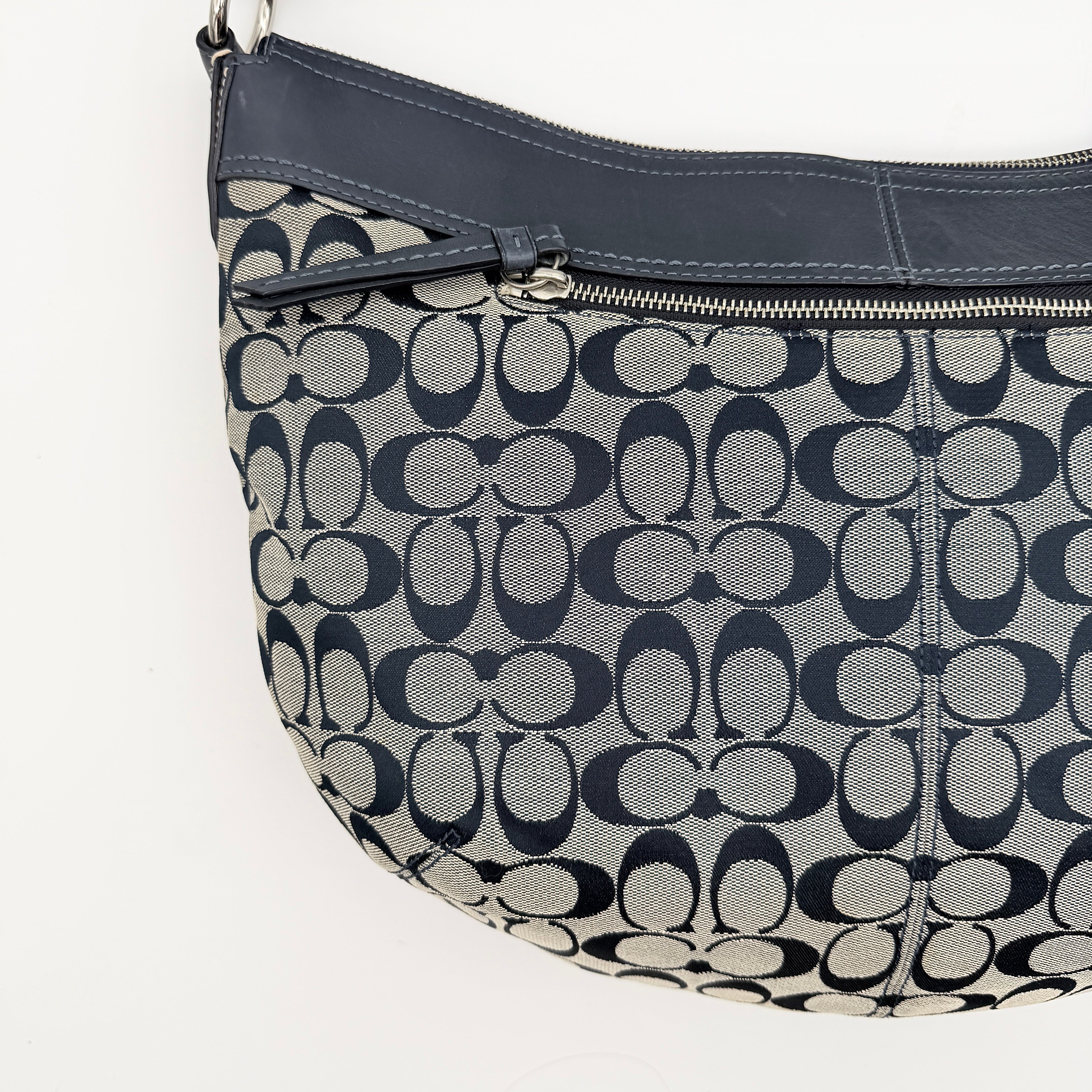 Coach Soho Pleated Hobo Shoulder Bag in black and grey signature jacquard with leather trim and silver hardware.