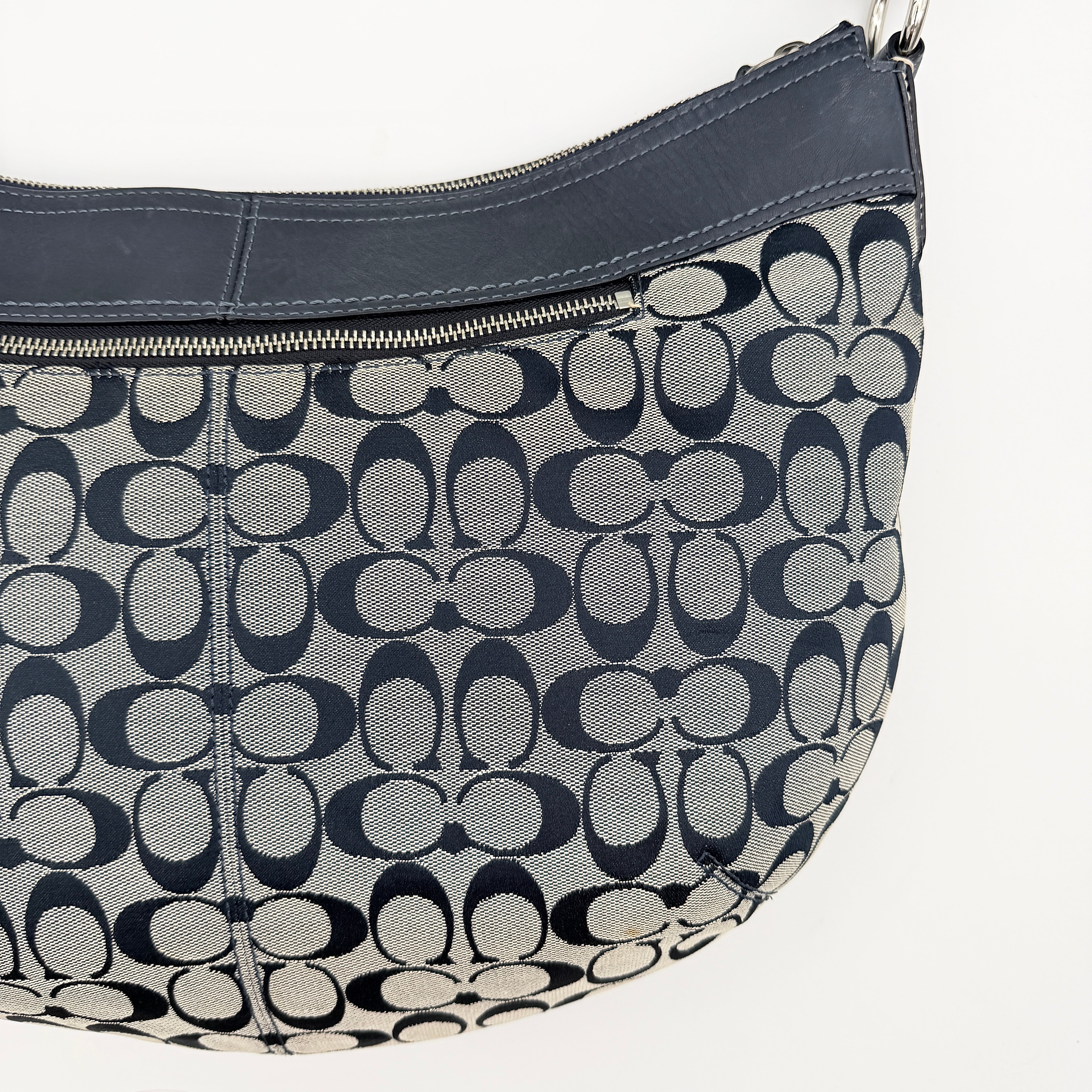 Coach Soho Pleated Hobo Shoulder Bag in black and grey signature jacquard with leather trim and silver hardware.