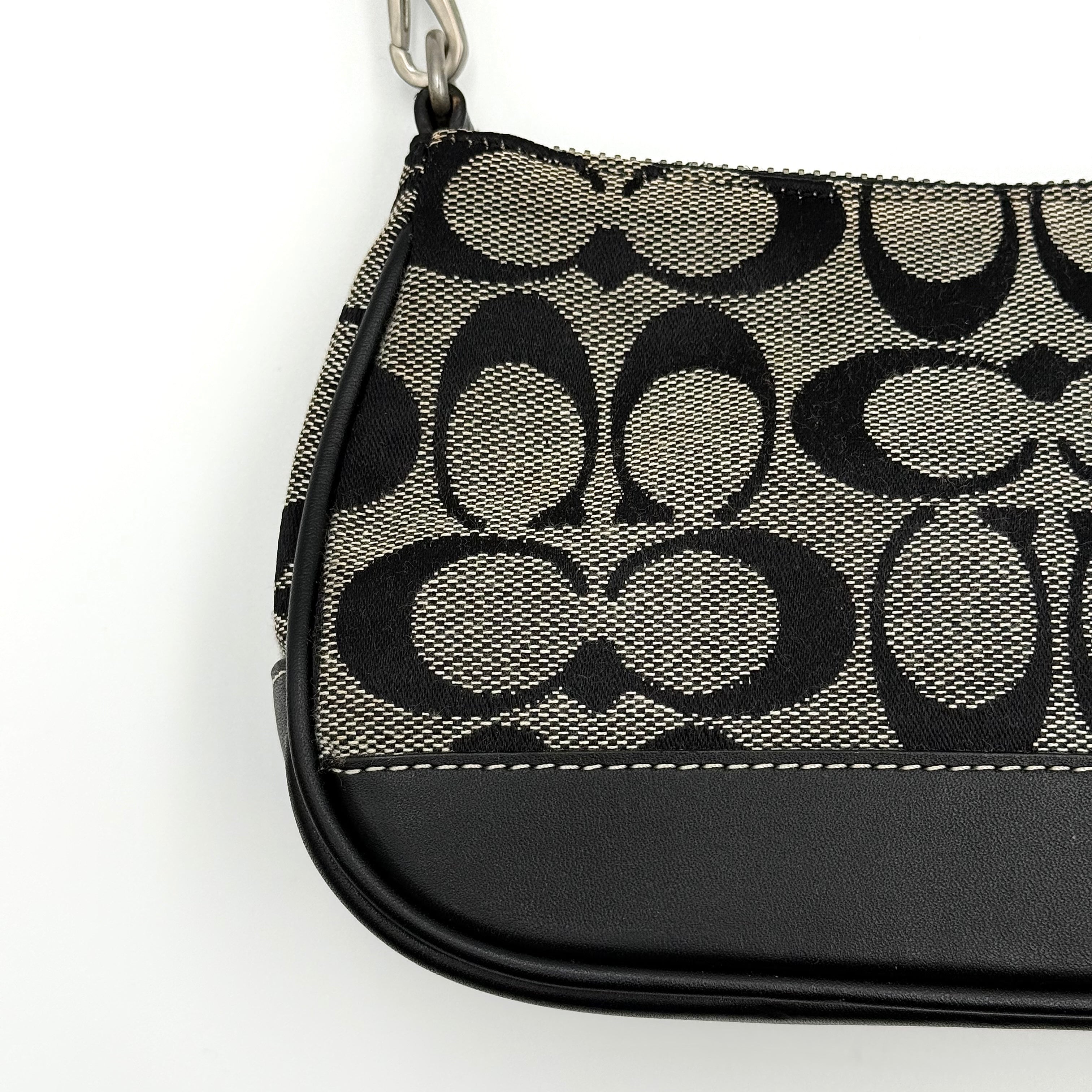 Coach Y2K Demi Shoulder Bag in black and grey signature jacquard with black leather trim and silver hardware.