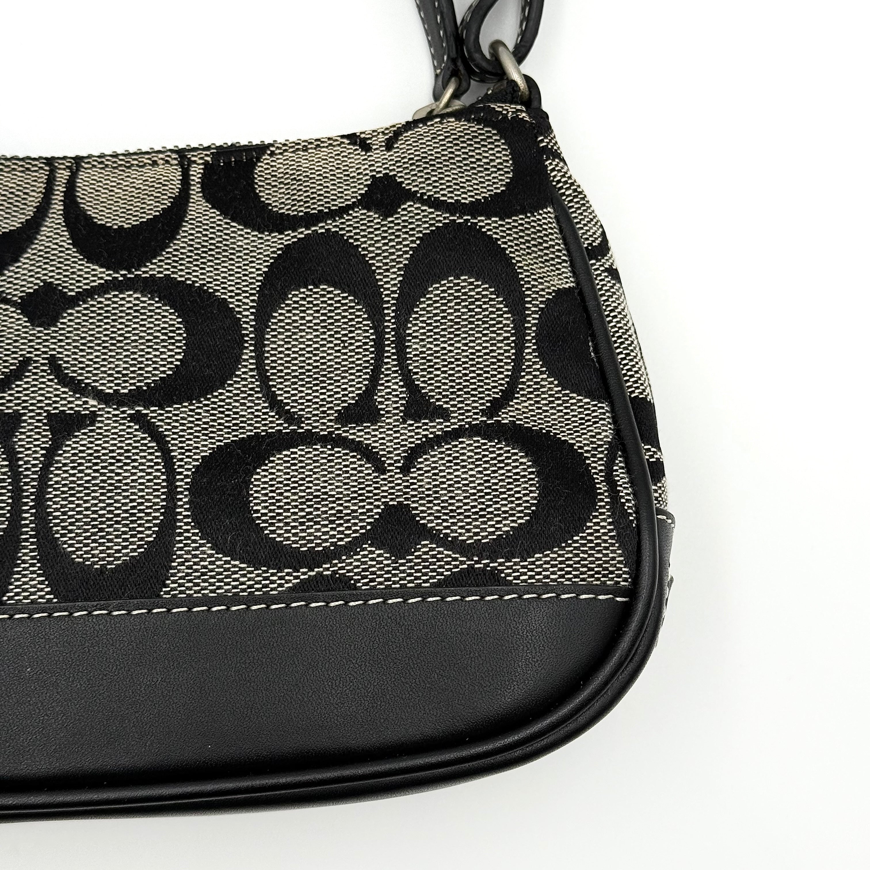 Coach Y2K Demi Shoulder Bag in black and grey signature jacquard with black leather trim and silver hardware.