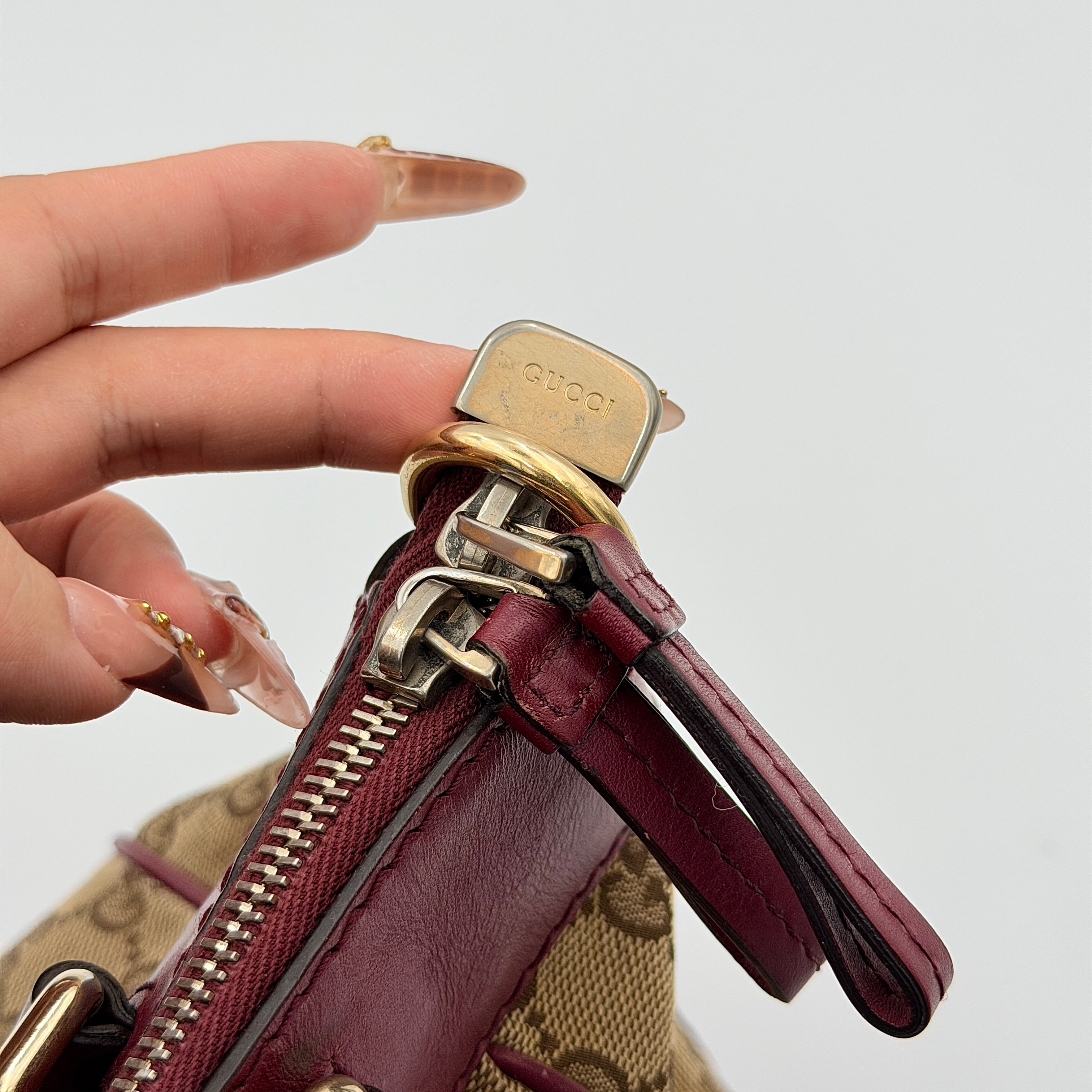 Gucci Mayfair Bow 2Way shoulder bag in beige GG monogram canvas with red leather trim, shown with detachable strap.