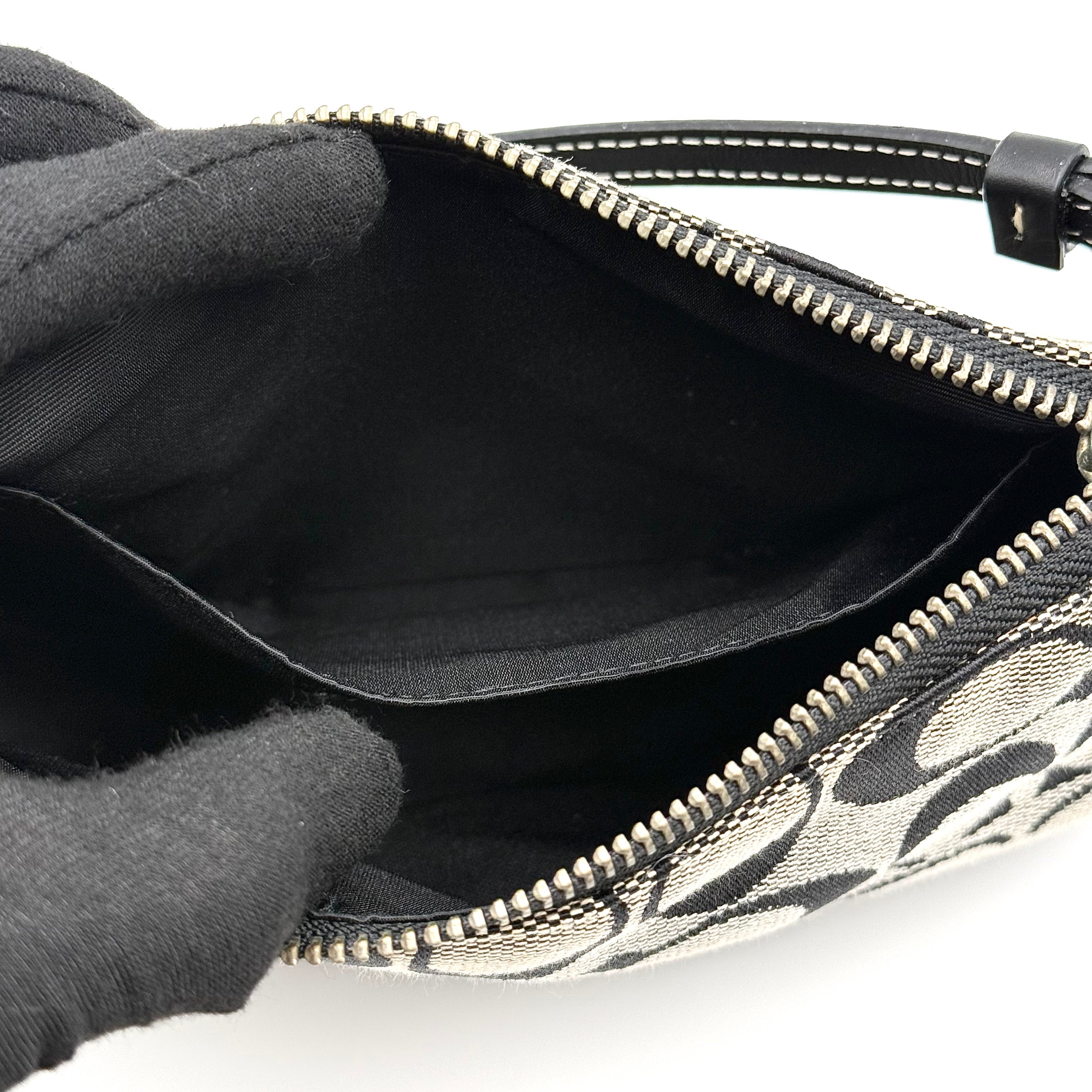 Coach Y2K Demi Shoulder Bag in black and grey signature jacquard with black leather trim and silver hardware.