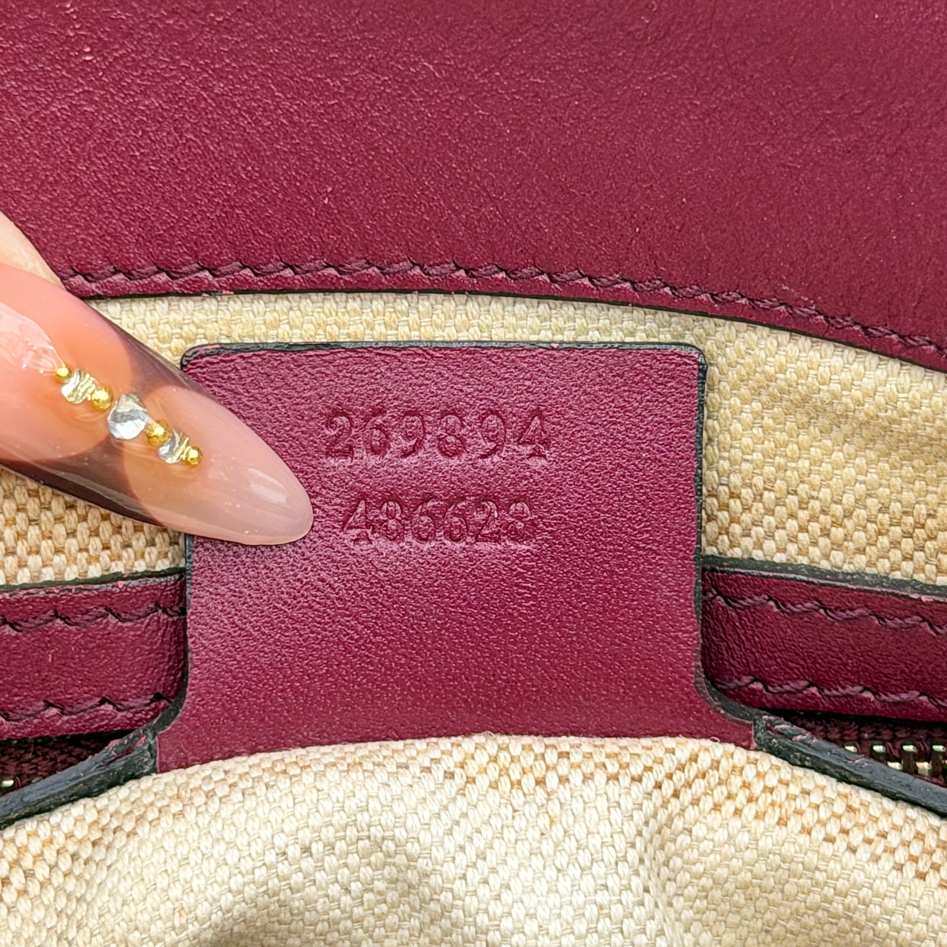 Gucci Mayfair Bow 2Way shoulder bag in beige GG monogram canvas with red leather trim, shown with detachable strap.