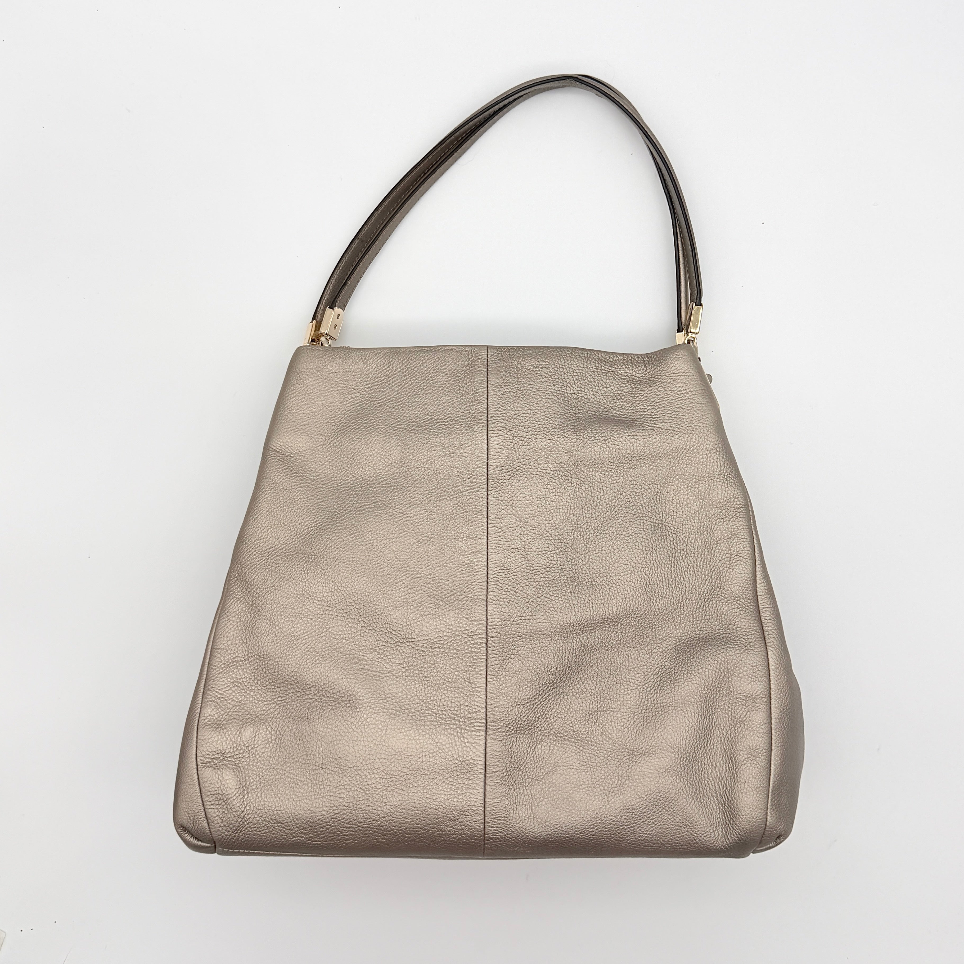Coach Madison Phoebe shoulder bag in metallic taupe pebbled leather with dual straps and gold-tone hardware.