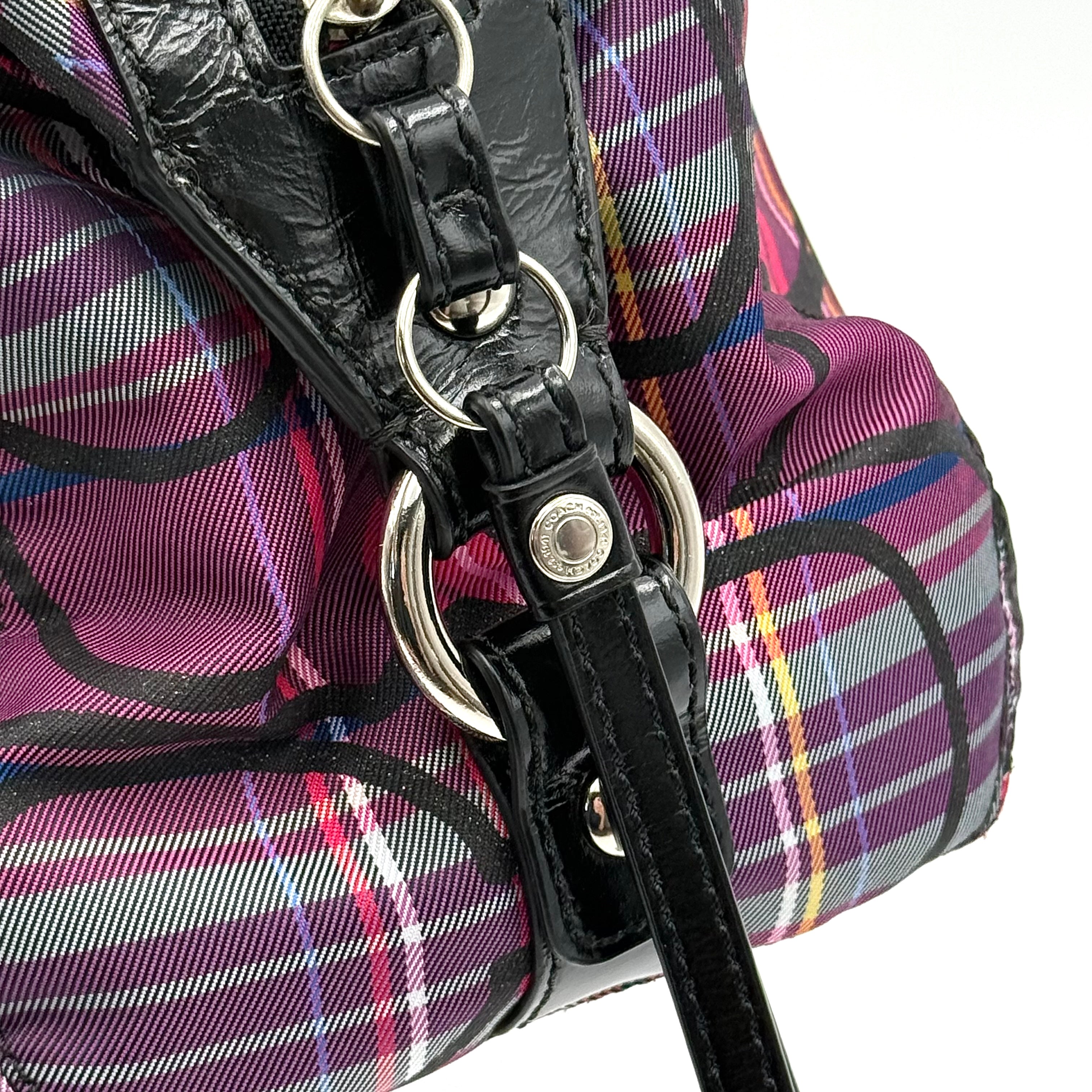 Coach Signature Poppy Tartan Shoulder Bag in vibrant multi plaid with bold black logo print, featuring black patent trim and silver hardware.