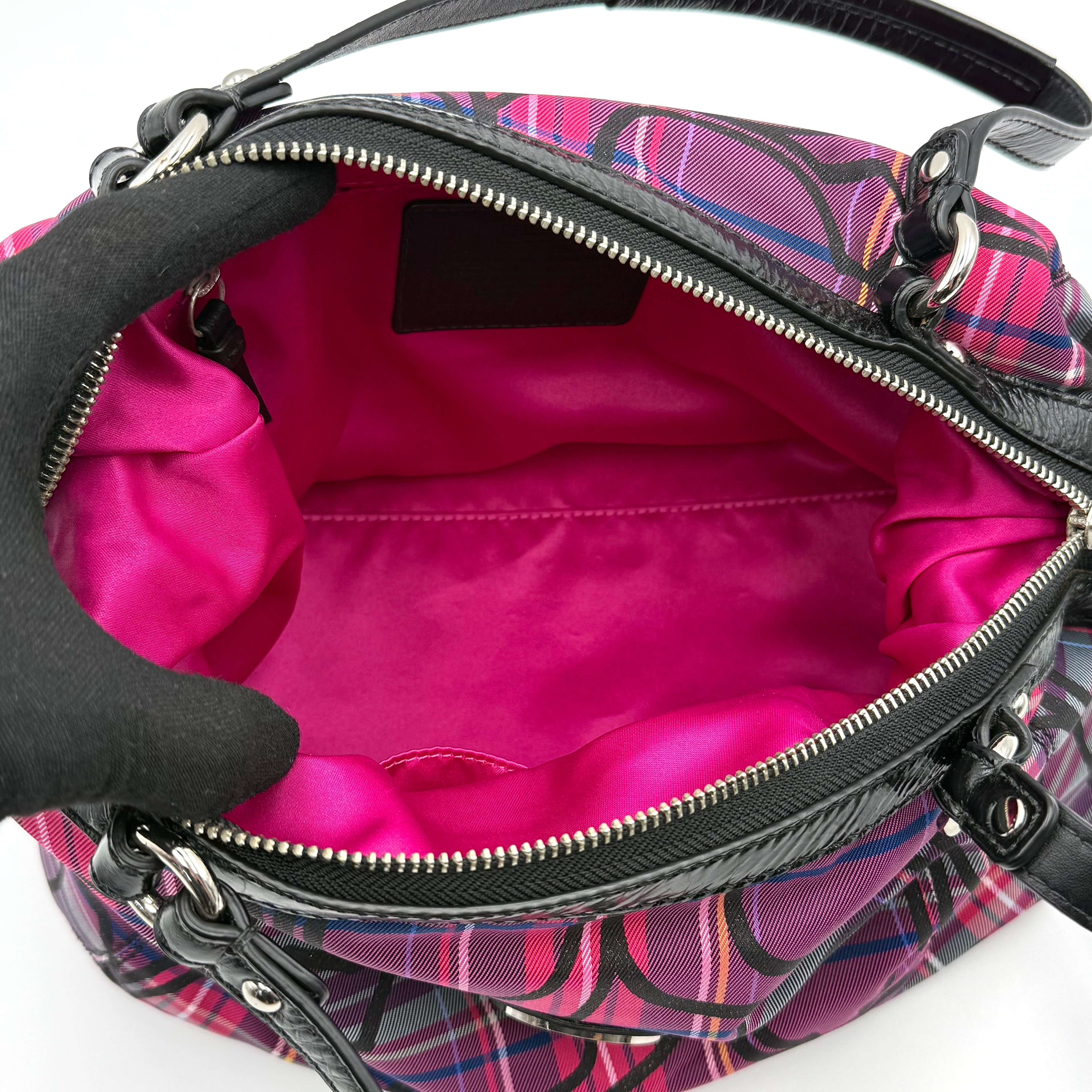 Coach Signature Poppy Tartan Shoulder Bag in vibrant multi plaid with bold black logo print, featuring black patent trim and silver hardware.