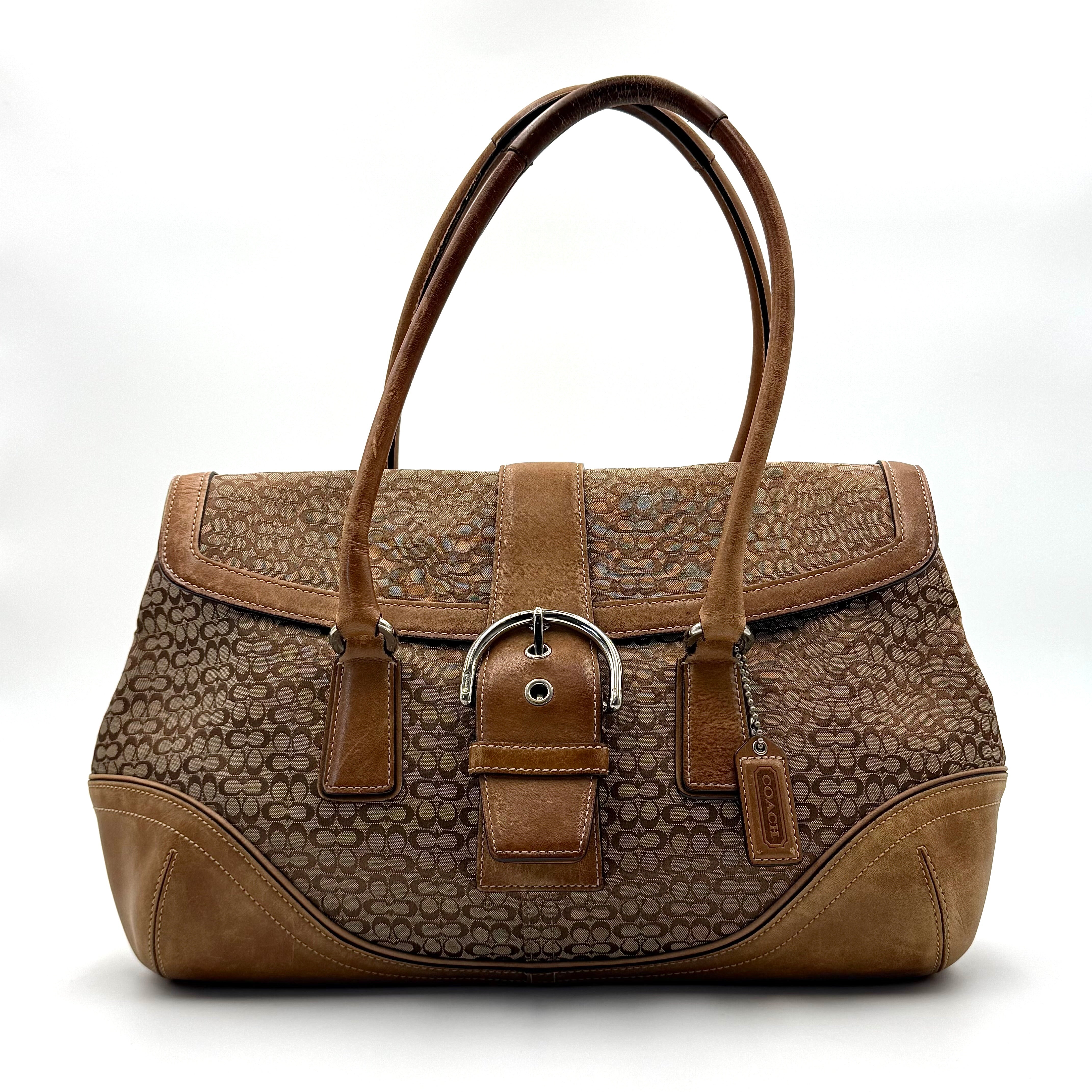 Front-facing view of the Coach Y2K Signature Soho Shoulder Bag in beige and tan jacquard with leather trim.