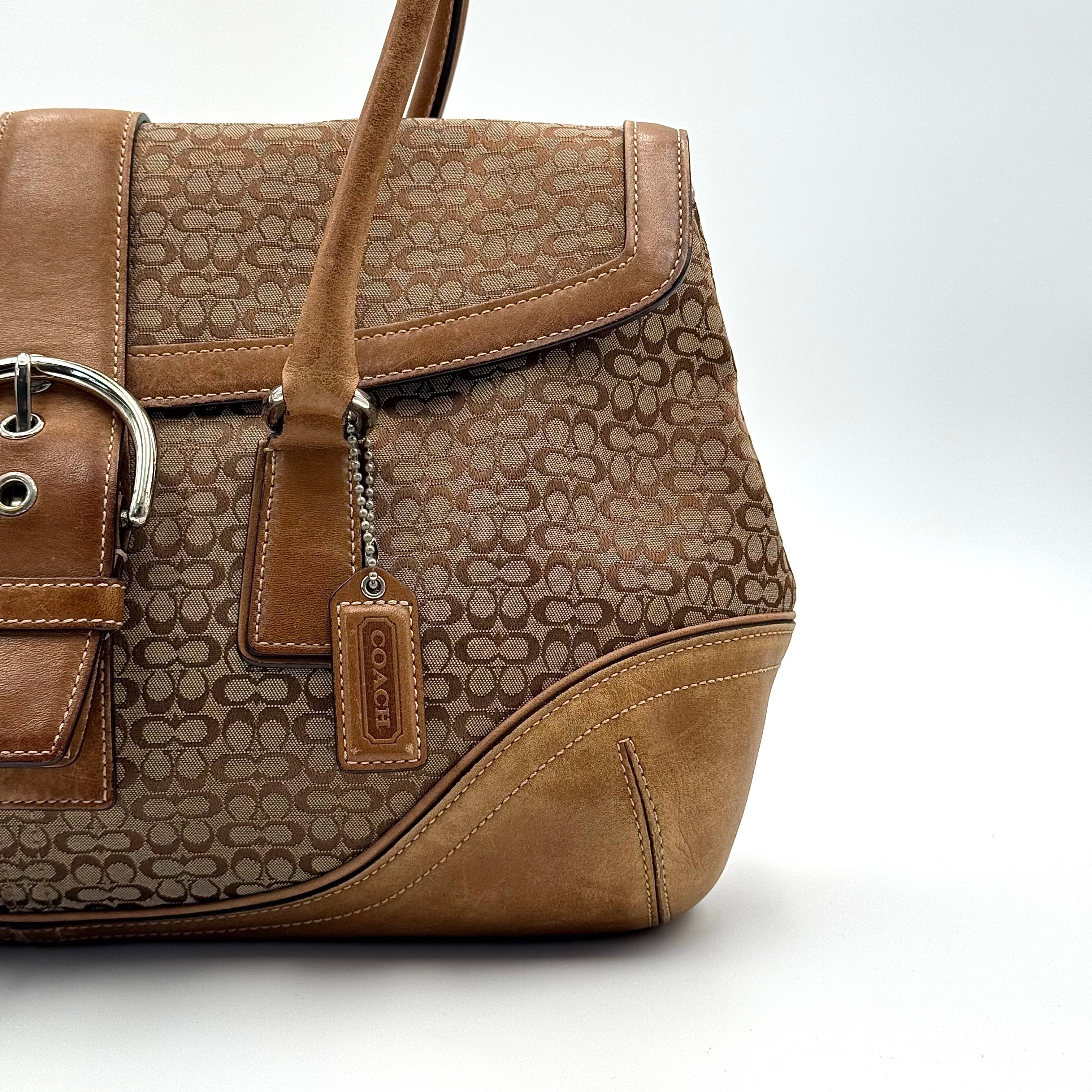 Front-facing view of the Coach Y2K Signature Soho Shoulder Bag in beige and tan jacquard with leather trim.