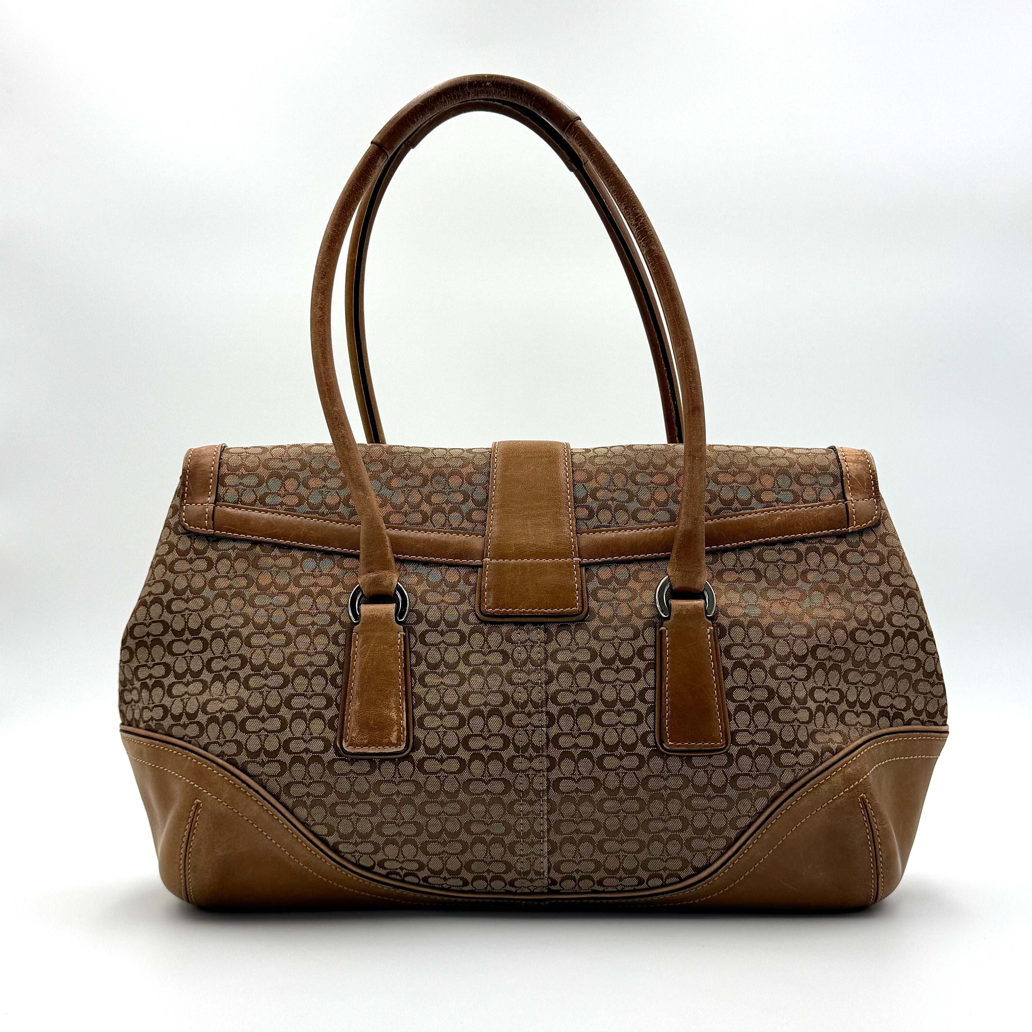 Front-facing view of the Coach Y2K Signature Soho Shoulder Bag in beige and tan jacquard with leather trim.