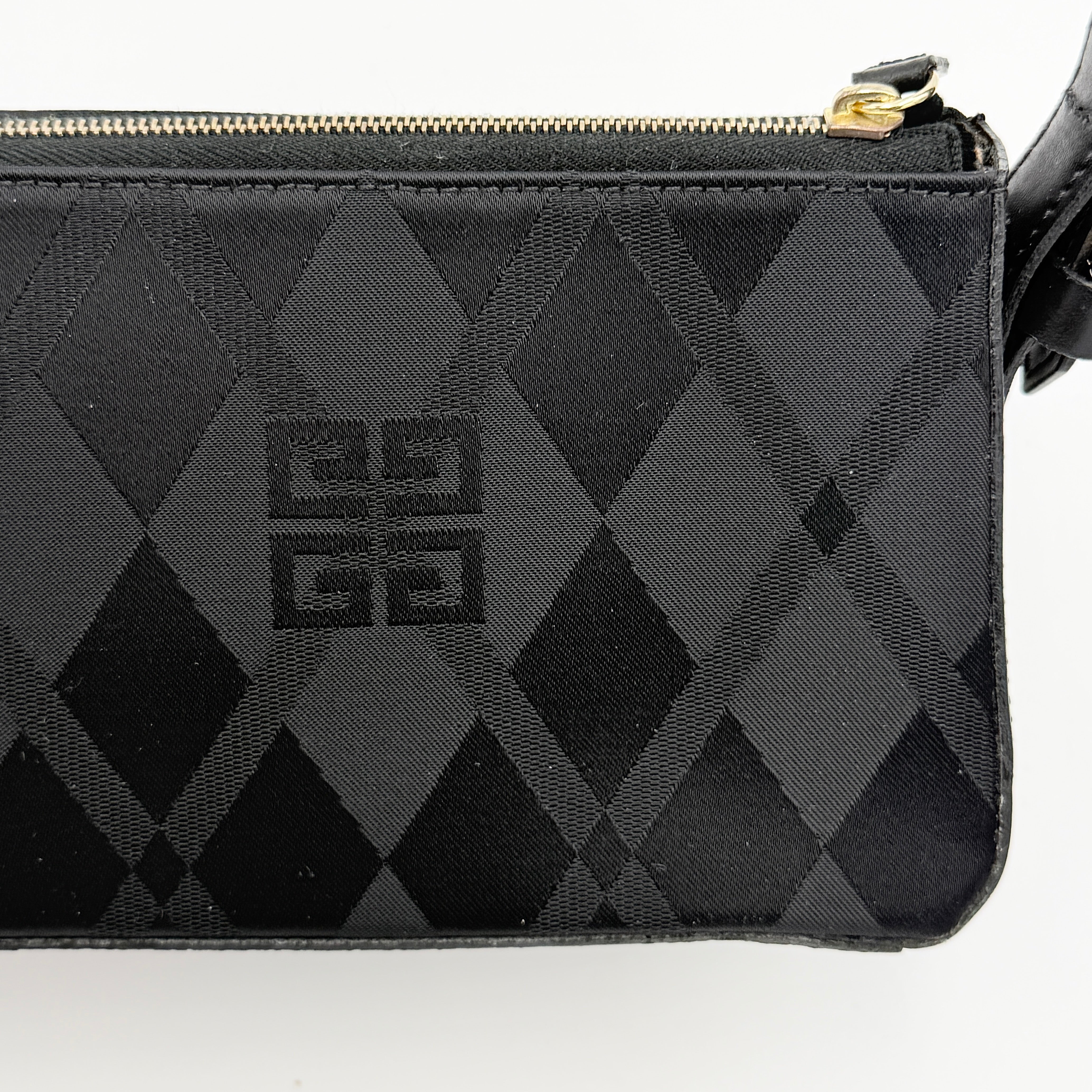 Givenchy 4G Monogram Pochette Shoulder Bag in black jacquard with leather strap and gold-tone hardware, photographed on white background.
