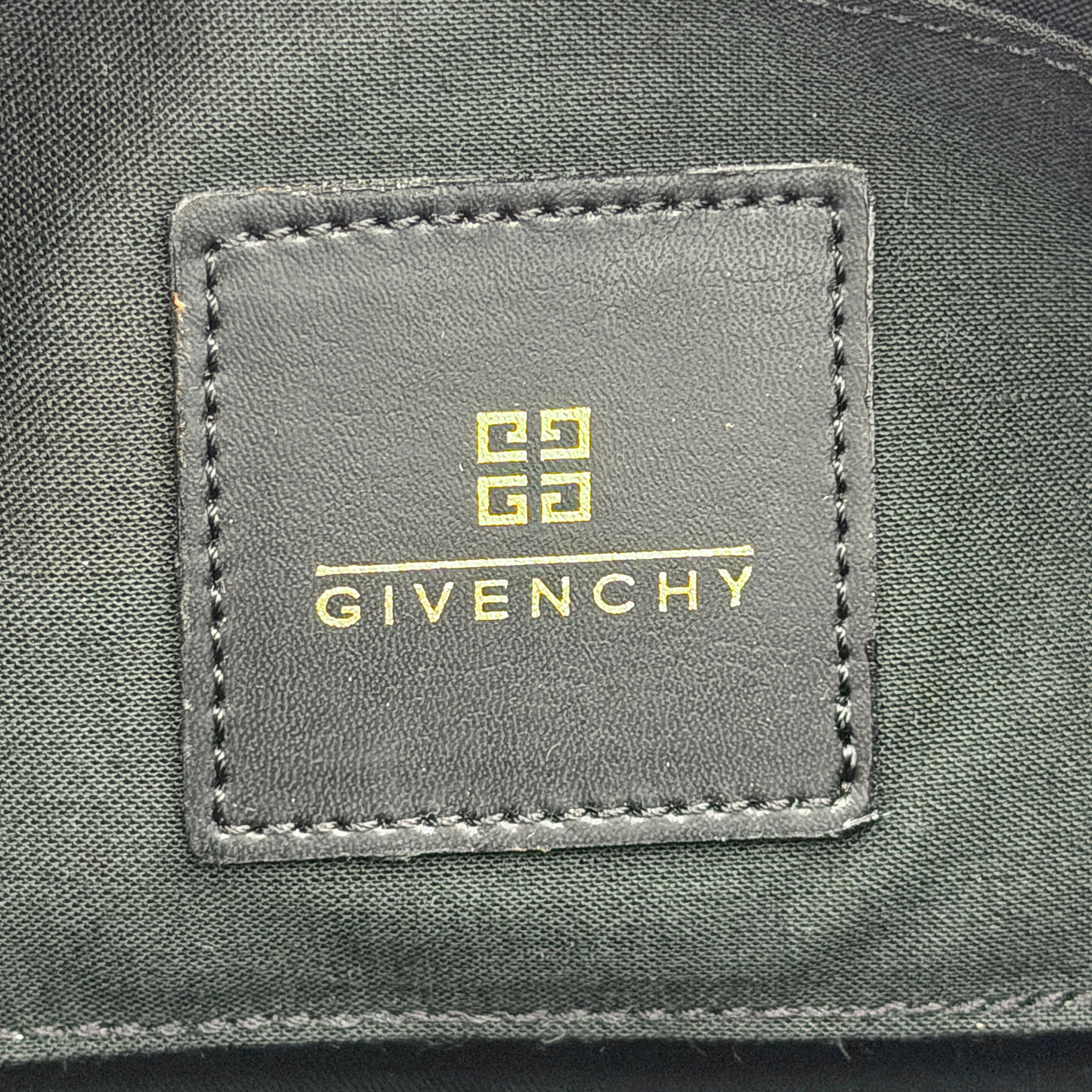 Givenchy 4G Monogram Pochette Shoulder Bag in black jacquard with leather strap and gold-tone hardware, photographed on white background.