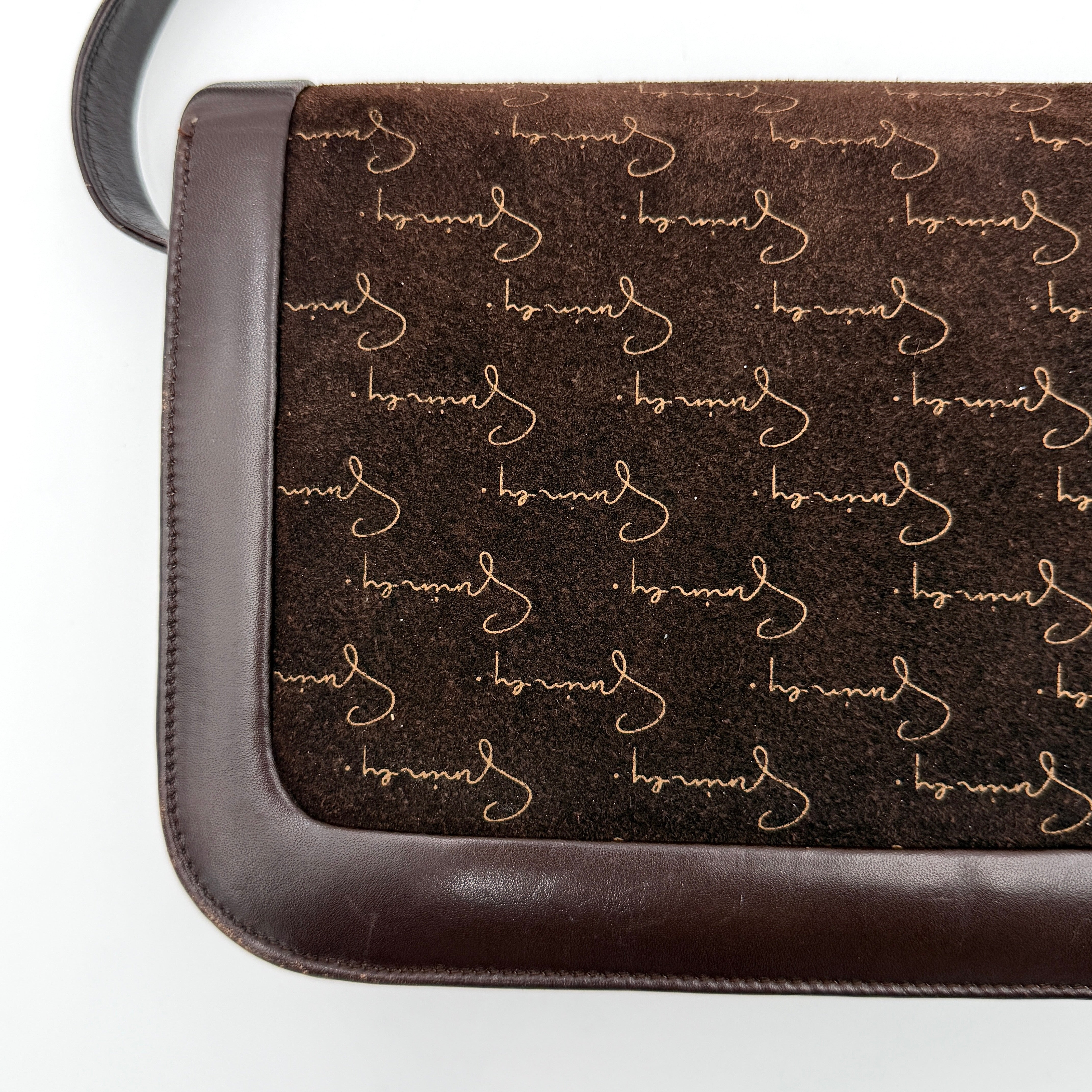 Givenchy 4G Monogram brown suede shoulder bag with leather trim and silver-tone clasp, photographed on a white background.