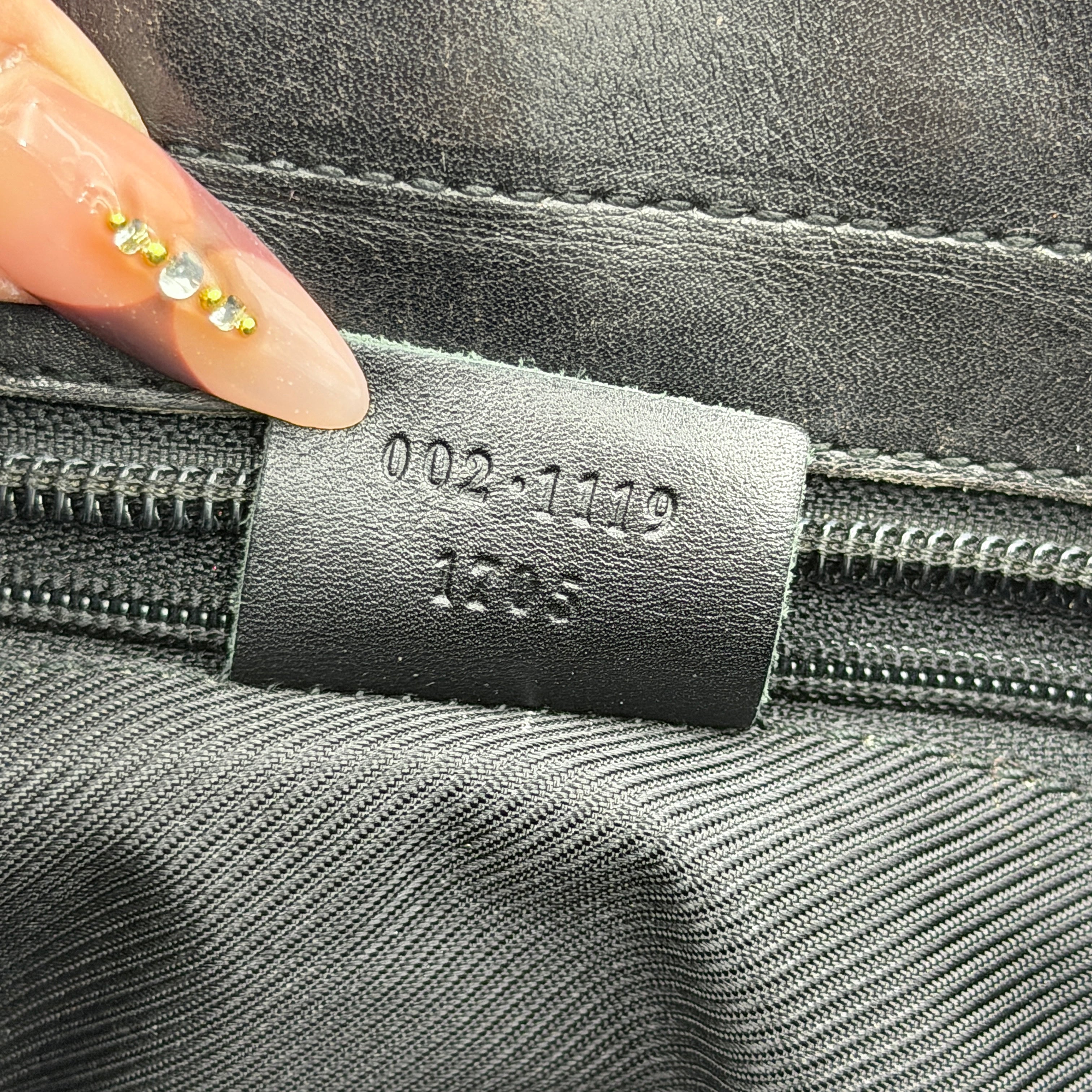 Gucci GG Monogram Leather Tote Bag in black canvas and leather, with structured top handles and allover GG motif.