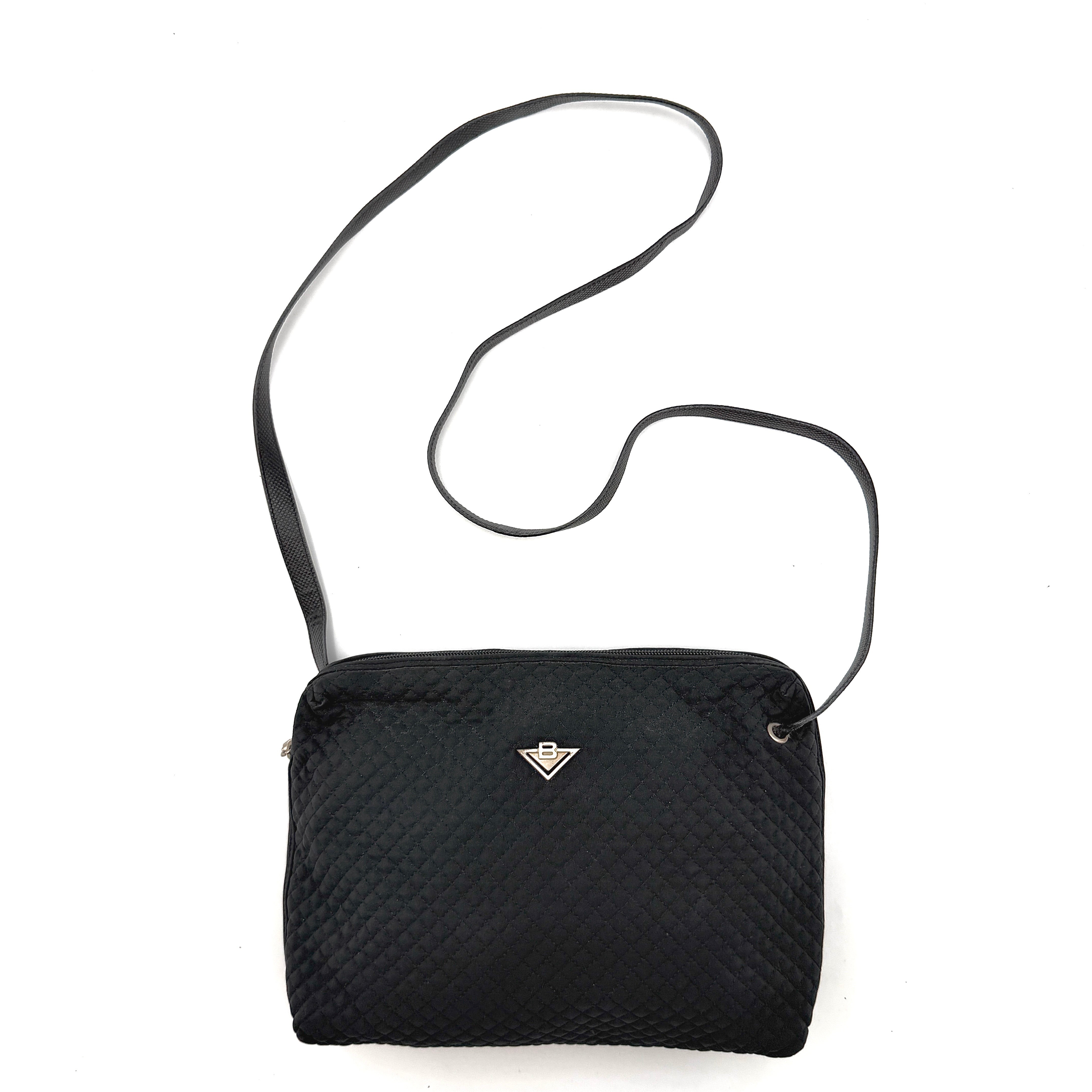 Bottega Veneta black quilted nylon crossbody bag with silver-tone logo hardware and leather strap.
