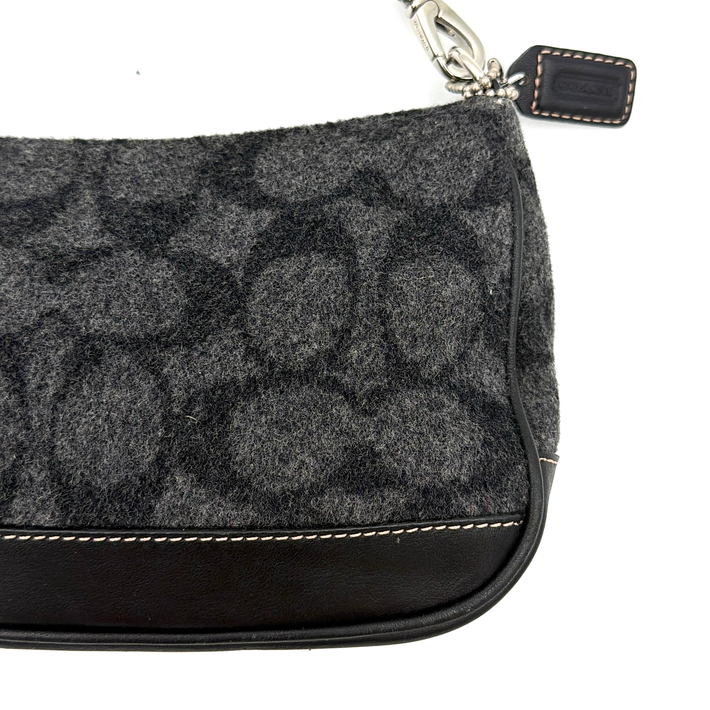 Coach Y2K Wool Demi Shoulder Bag in black and grey with monogram pattern, leather trim, and silver-tone details.