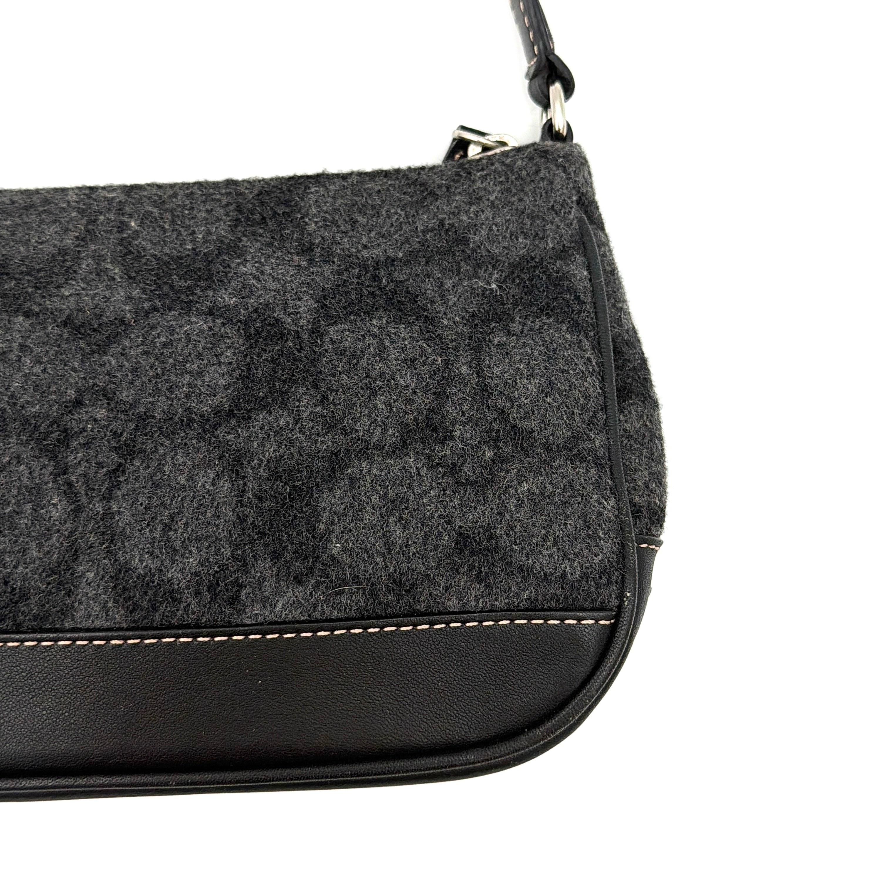 Coach Y2K Wool Demi Shoulder Bag in black and grey with monogram pattern, leather trim, and silver-tone details.
